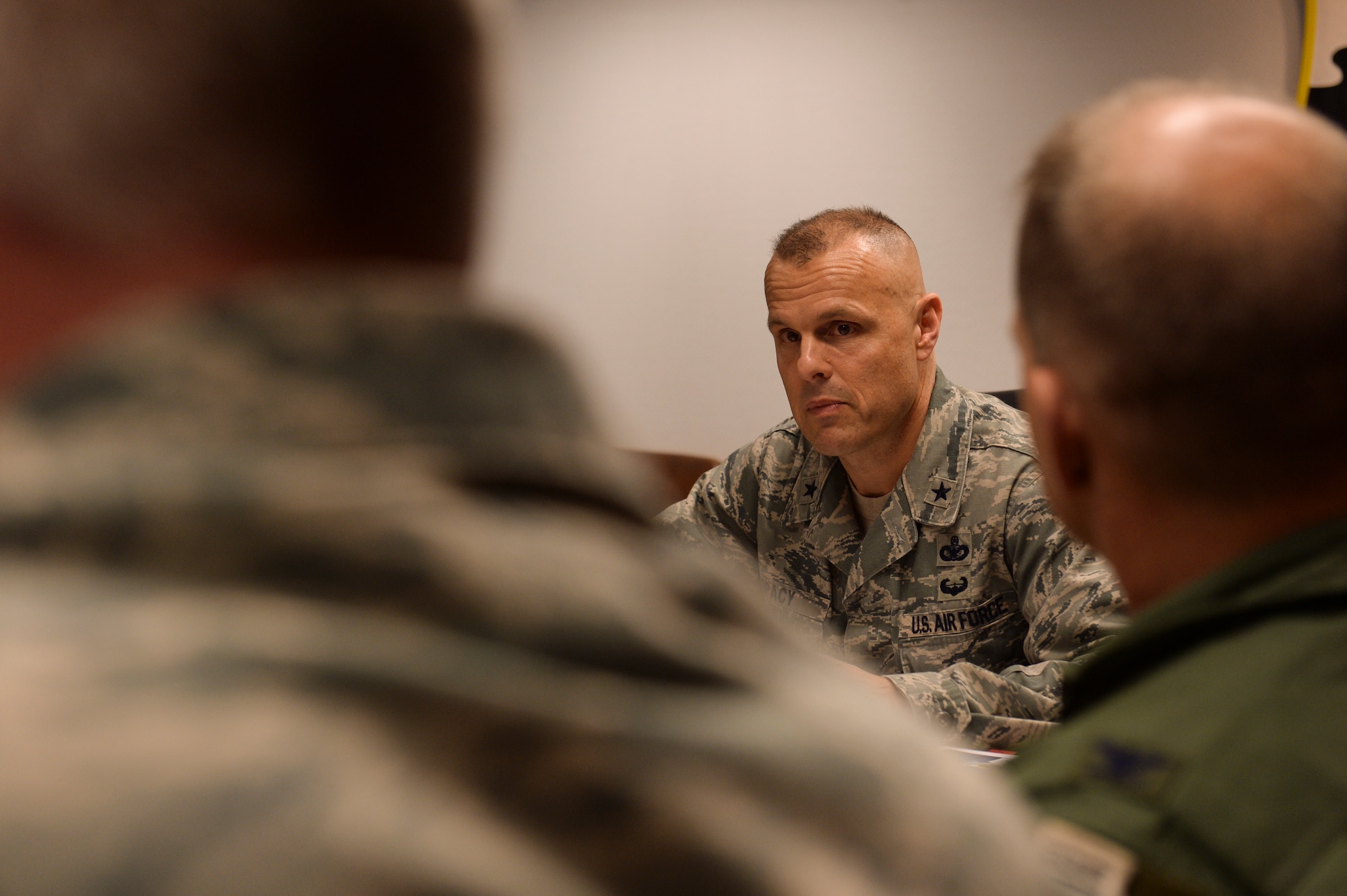 U.S. Air Force Brig. Gen. Bradley Spacy, United States Air Forces in Europe and Air Forces Africa director of logistics, installations and missions support, answers questions from base leadership April 16, 2014, at Spangdahlem Air Base, Germany. As a part of his visit, the general was briefed about the base community involvement, and future plans for the installation. (U.S. Air Force photo by Senior Airman Rusty Frank/Released)
