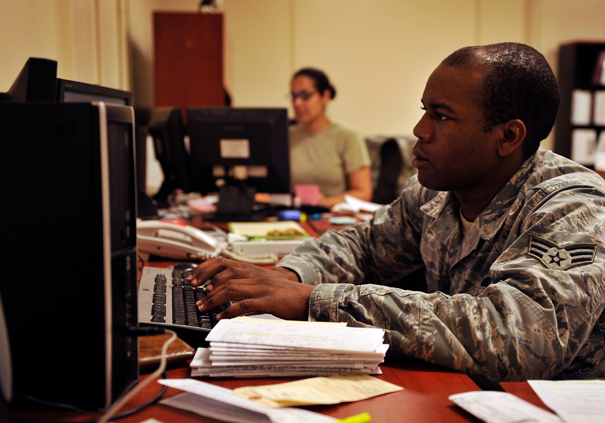 U.S. Air Force Senior Airman Antonio Smith, 18th Logistic Readiness Squadron flight service center journeyman, enters serviceable part information into enterprise solution supply on Kadena Air Base, Japan, April 15, 2014. When Airmen are unable to fix parts, the broken parts are routed through the 18th LRS flight service center before being sent back to the U. S. for maintenance or repair. They are also responsible for distributing new and repaired items back to the original units. (U.S. Air Force photo by Naoto Anazawa)