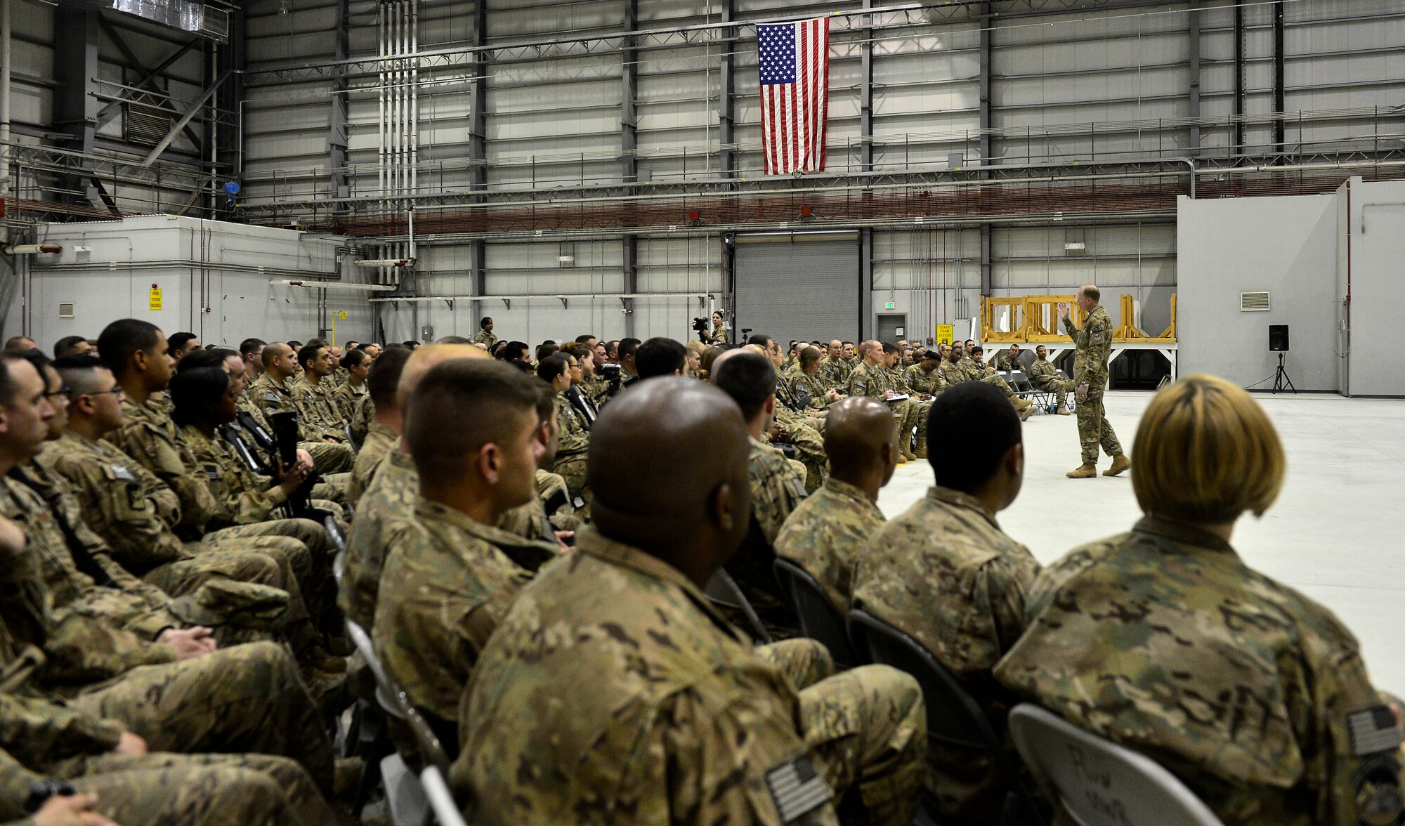 Chief Master Sgt. of the Air Force James A. Cody speaks to Airmen during a visit to Bagram Air Field, Afghanistan, April 13, 2014. Cody visited Bagram Air Field during his trip through Afghanistan to encourage, inform and thank Airmen for their hard work supporting Operation Enduring Freedom. His visit to Bagram concluded with a 60-minute question and answer all-call with nearly 500 Airmen. (U.S. Air Force photo by Staff Sgt. Vernon Young Jr.)