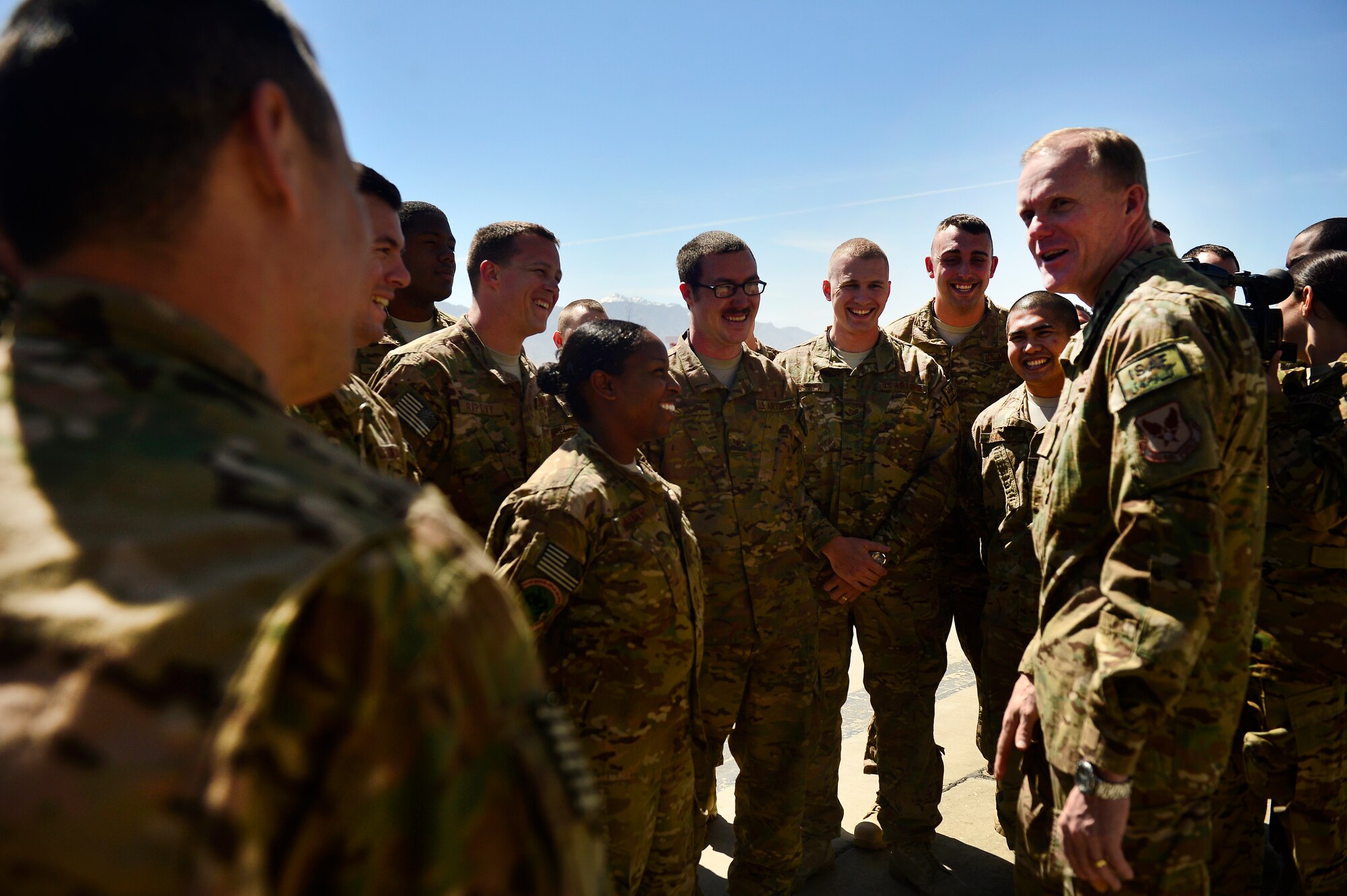 Chief Master Sgt. of the Air Force James A. Cody shares a laugh with 455th Expeditionary Maintenance Support Group Airmen during a visit to Bagram Air Field, Afghanistan, April 13, 2014. The Airmen are responsible for maintaining C-130's. Cody visited Bagram Air Field during his trip through Afghanistan to encourage, inform and thank Airmen for their hard work supporting Operation Enduring Freedom. His visit to Bagram concluded with a 60-minute question and answer all-call with nearly 500 Airmen. (U.S. Air Force photo by Staff Sgt. Vernon Young Jr.)