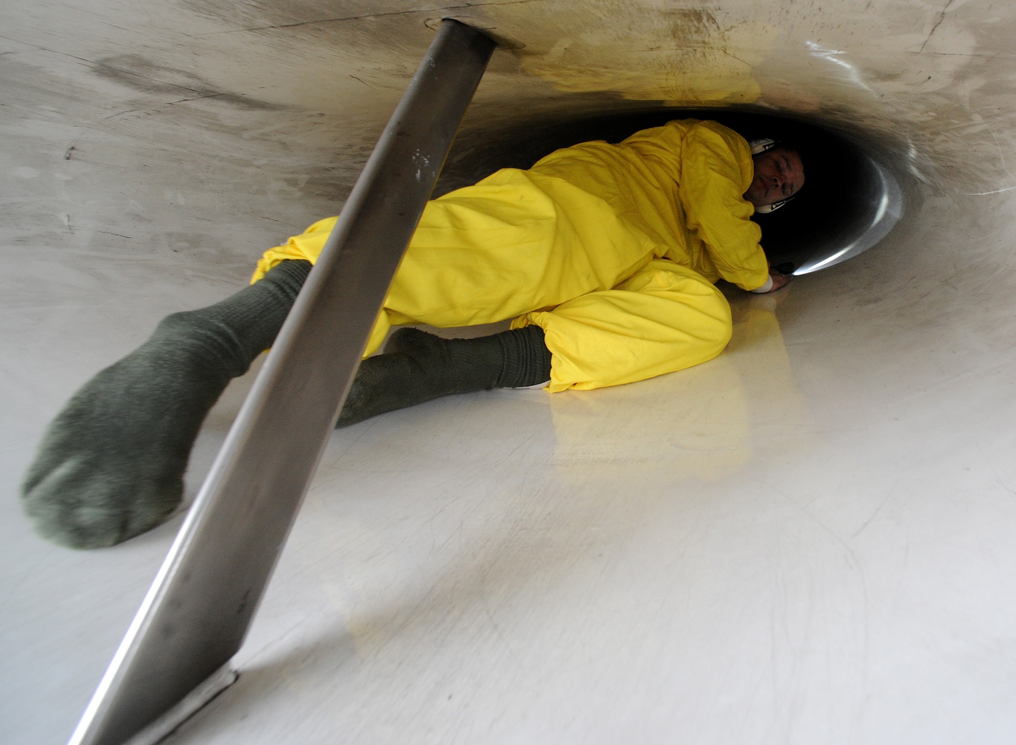 Staff Sgt. Elijah Samala, 31st Aircraft Maintenance Squadron crew chief, checks the intake on an F-16 Fighting Falcon at Campia Turzii, Romania, April 16, 2014, after a flying mission during Exercise Dacian Viper 2014. Crew chiefs check for cracks and oil leaks after each flight to prevent further damage. (U.S. Air Force photo/Staff Sgt. R.J. Biermann)