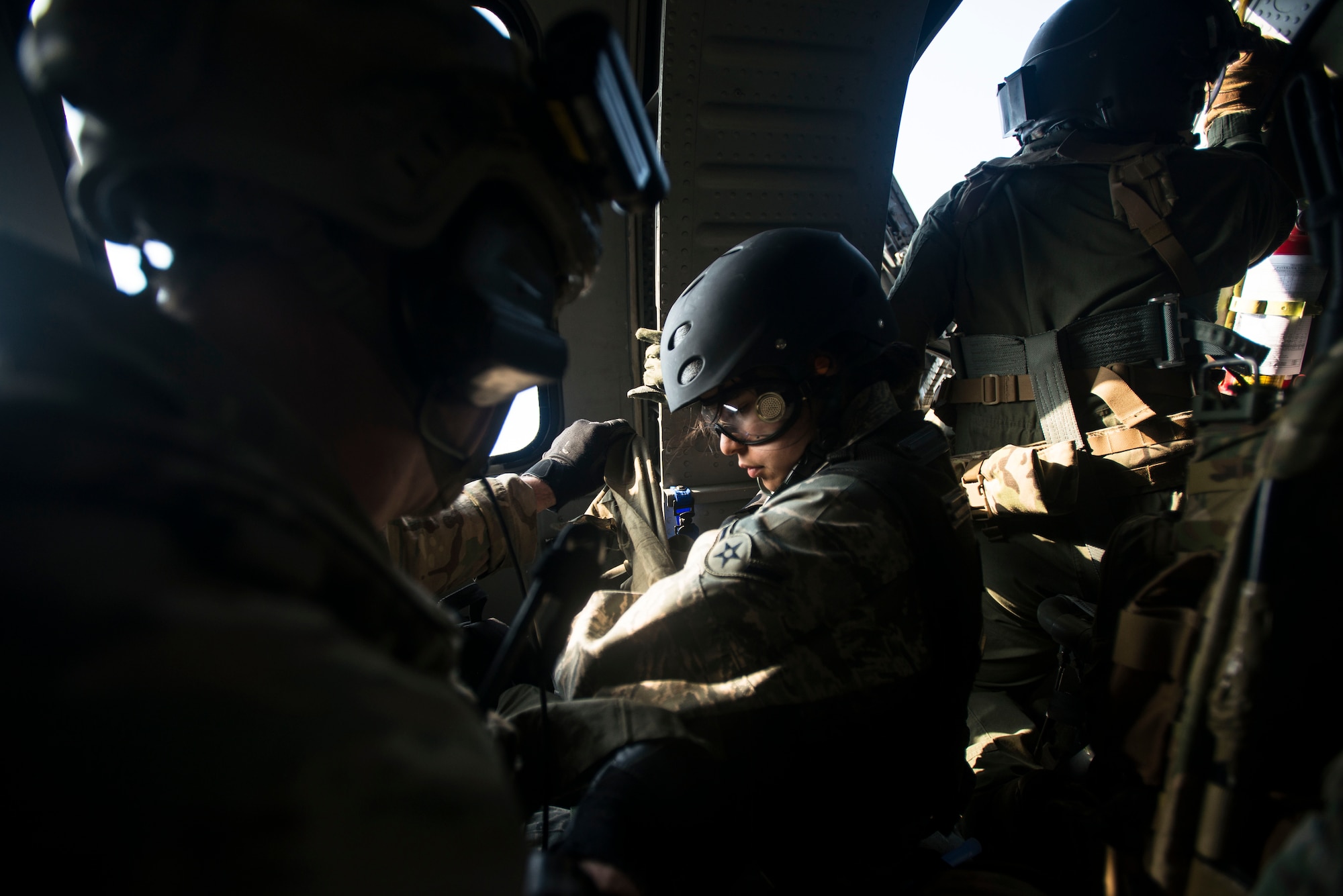 Airman Danielle Trejo, a simulated injury victim, is treated for a broken arm during exercise Pacific Thunder April 14, 2014, in the Republic of Korea. For the exercise, Trejo was rescued from a remote location by Survival, Evasion, Rescue and Escape specialists and hoisted into a HH-60 Pave Hawk helicopter. (U.S. Air Force photo by Staff Sgt. Jake Barreiro)