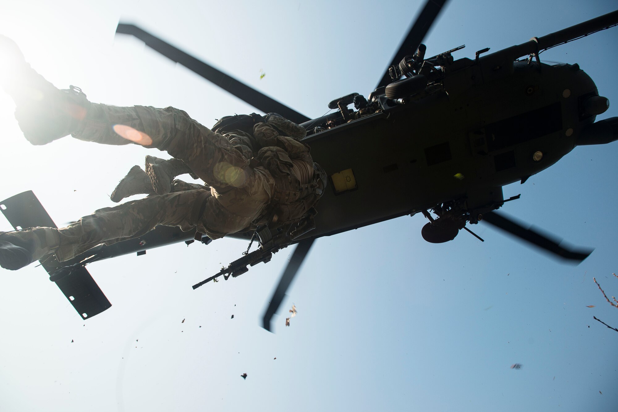 Airman Danielle Trejo, a simulated injury victim, is lifted into an HH-60 Pave Hawk helicopter during exercise Pacific Thunder April 14, 2014, in the Republic of Korea. Pacific Thunder is hosted by Osan Air Base, and features numerous United States and RoK aircraft. (U.S. Air Force photo by Staff Sgt. Jake Barreiro)