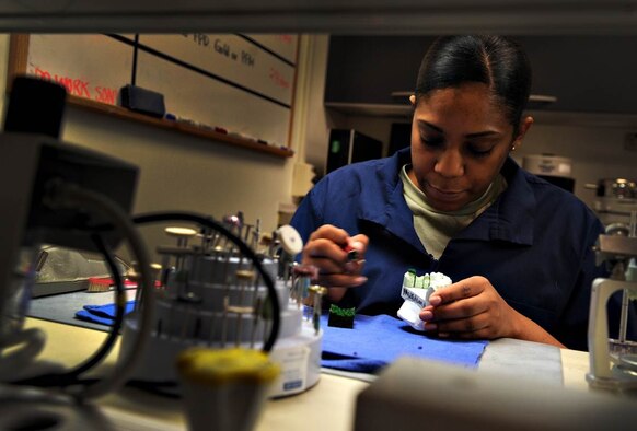 Staff Sgt. Markeisha Robinson, 51st Dental Squadron dental laboratory technician, works on a dental mold at Osan Air Base, Republic of Korea, April 3, 2014. Robinson is this week’s Airman Spotlight winner. (U.S. Air Force photo/Senior Airman Siuta B. Ika)