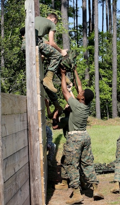 JROTC cadets compete during the 2014 Superintendent's Cup at Bluffton High School, in Bluffton, S.C., April 11. The event hosted five county high school JROTC units to compete in academia, a physical fitness test, an obstacle course, platoon drill, and color guard.