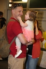 Sgt. Tyler R. Wilde, a flight line mechanic with Marine Heavy Helicopter Squadron (HMH) 464, reunites with his two-year-old daughter, Maddisyn, and wife, Caitlin A. Wilde, in the lobby of the Albert J. Ellis Airport in Jacksonville, N.C., April 20, after six months of separation while he was deployed to Okinawa, Japan, with HMH-464. Nine Marines, including Wilde, were part of the advance party’s return from the six-month deployment. (U.S. Marine Corps photo by Sgt. Alicia R. Leaders/Released)