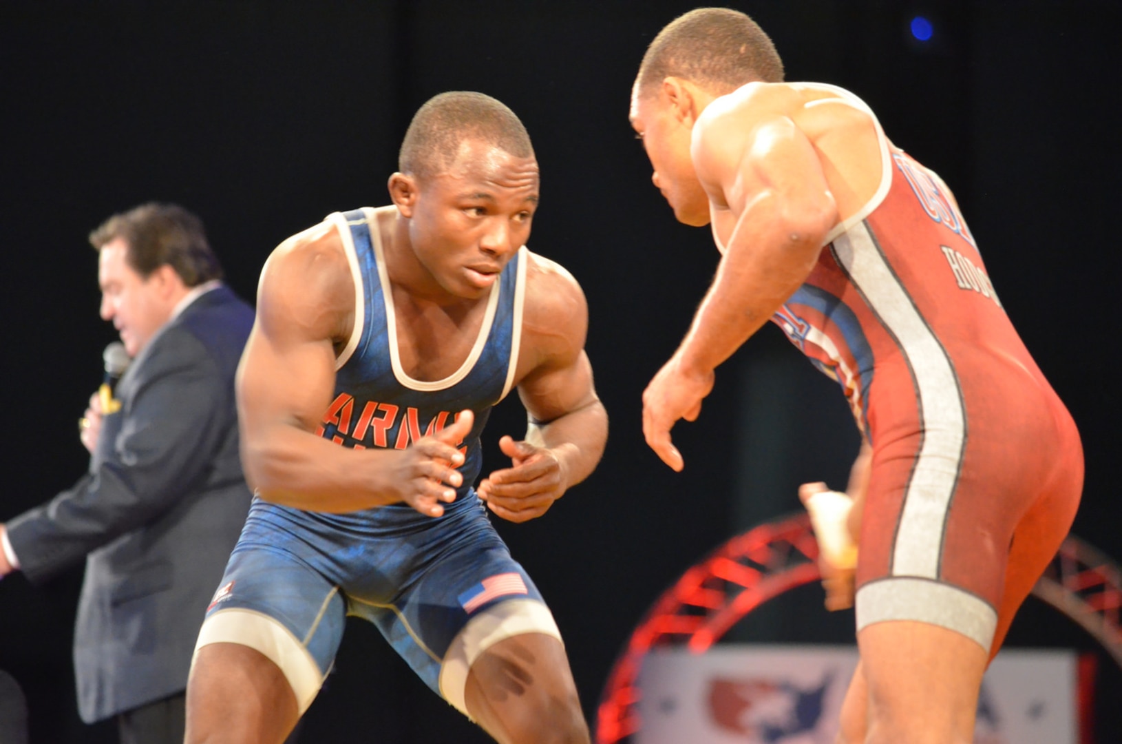 Mango (left) defeats Hodge in the 59 kg/130lbs Greco-Roman semi-finals.