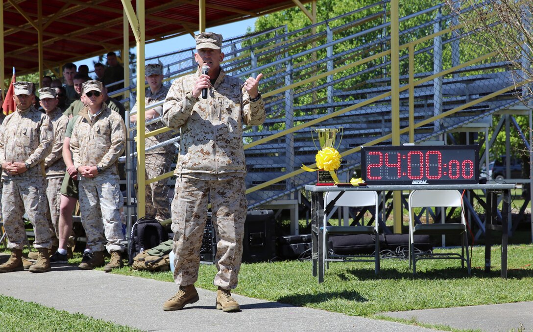 Brigadier Gen. James W. Lukeman, the commanding general for 2nd Marine Division, talks to Division Marines and sailors before starting the R.A.C.E for Suicide Awareness aboard Marine Corps Base Camp Lejeune, NC, April 16, 2014. The event was conducted in order to raise suicide awareness, expose division personnel to available counseling services, and enhance unit cohesion through a unique team-building event.