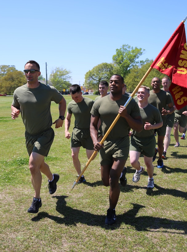 Marines with 2nd Light Armored Reconnaissance Battalion, Headquarters and Support company, run together for the R.A.C.E for Suicide Awareness held at Marine Corps Base Camp Lejeune, NC, April, 16, 2014. Runners and personnel involved with the relay hope to ultimately have increased unit cohesion and camaraderie among the division units, and have maximum exposure to various counseling and support services available to service members.