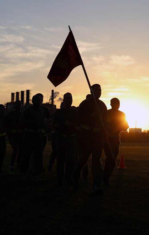Marines with 2nd Assault Amphibious Battalion, 2nd Marine Division run together on the second day of the 24 hour R.A.C.E for Suicide Awareness at Marine Corps Base Camp Lejeune, NC, April, 17, 2014. Marines and sailors from various battalions throughout the division volunteered to run the relay to raise awareness on suicide prevention and to raise Marines and sailors awareness on different support services.