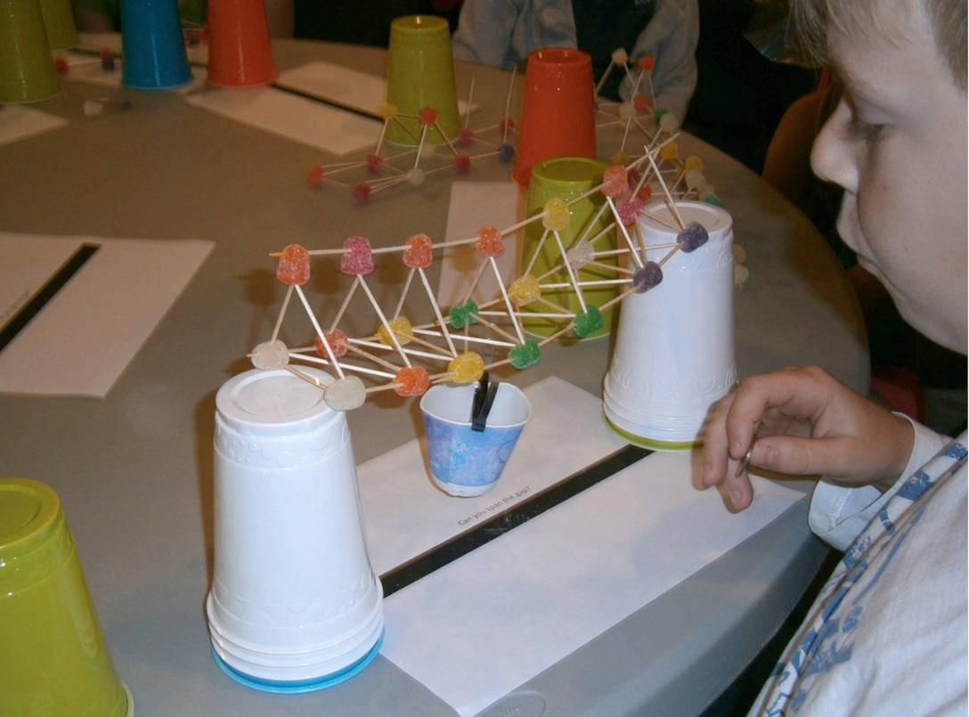 Members of the U.S. Army Corps of Engineers Savannah District hosted a fun activity at E.A. White Elementary School to promote Science, Technology, Engineering and Math (STEM), April 15, 2014. Students in grades 3 – 5 were asked to design and create a bridge to span a 10-inch gap using only toothpicks and gum drops. The final designs were then tested to see which bridge held the most weight. The bridges were weighed down using quarters. The students whose bridges held the most weight from each class were awarded prizes. The sturdiest bridge held 12 quarters.