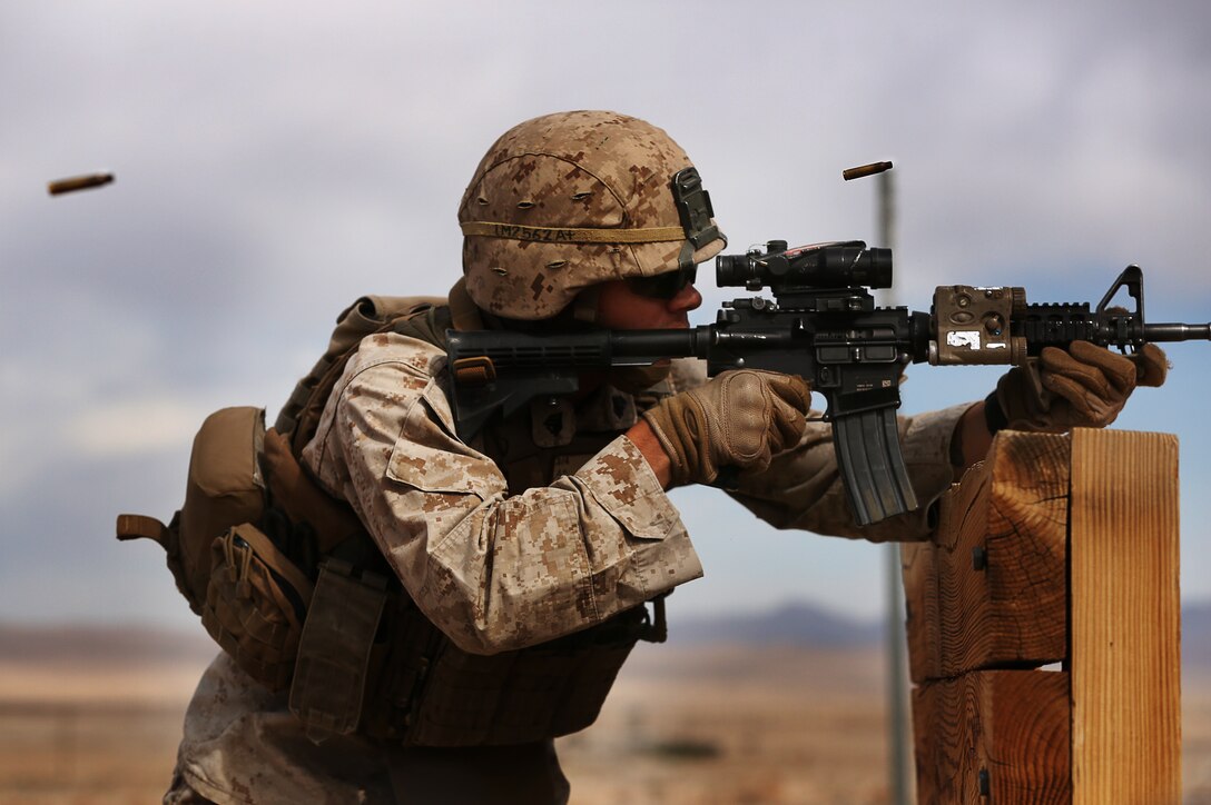 A Marine with Company I, 3rd Battalion, 4th Marines, provides suppressive fire during an exercise to evaluate Marines on
their abilities on the M136 AT4 rocket 
launcher at Range 104 April 11. The Marines first conducted a dry-fire run before turning to live-fire.
