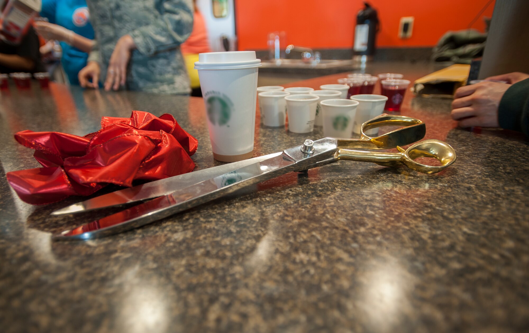 Ceremonial scissors lay on the counter at the B-fifty Brew on Minot Air Force Base, N.D., April 15, 2014. The ribbon-cutting ceremony marked the grand opening of the coffee shop. (U.S. Air Force photo/Airman 1st Class Apryl Hall)