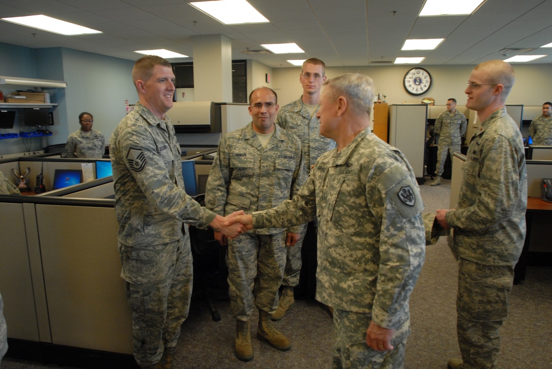 General Frank J. Grass, Chief, National Guard Bureau, visits Airmen of the 126th Air Refueling Wing, Scott Air Force Base, Ill., April 9, 2014. The 126 ARW, assigned to the Illinois Air National Guard, performs aerial refueling missions with the KC-135R Stratotanker in support of U.S. military and allied aircraft. (Air National Guard photo by Master Sgt. Ken Stephens)