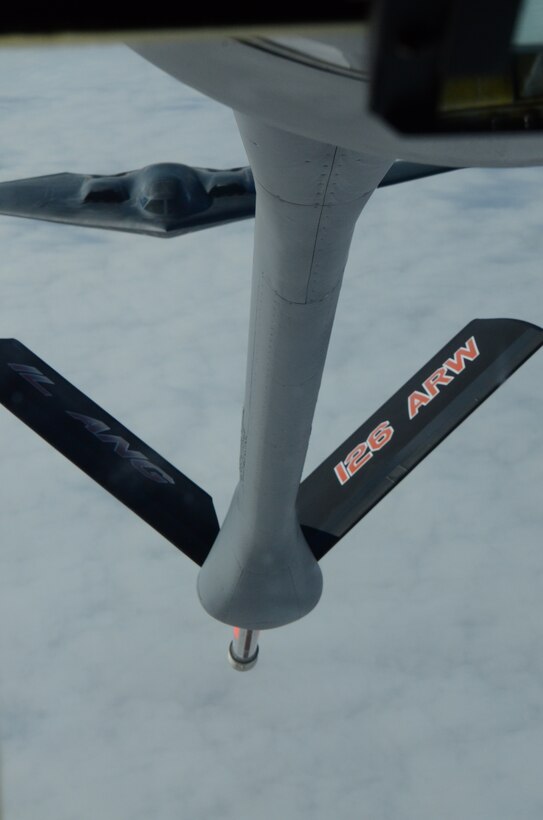 A KC-135R Stratotanker from the 126 ARW, an Illinois Air National Guard unit stationed at Scott Air Force Base, Ill., refuels a B-2 Spirit from Whiteman Air Force Base, Mo. Both the KC-135R and B-2 are key pieces of USSTRATCOM's global strike and strategic deterrence missions to deter regional and strategic threats. USSTRATCOM relies on various task forces for the execution of its global missions, including space operations, information operations, missile defense, global command and control; intelligence, surveillance and reconnaissance (ISR); global strike and strategic deterrence, and combating weapons of mass destruction. (Air National Guard photo by Senior Airman Elise Stout) 
