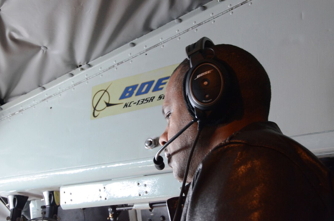 Senior Master Sgt. Arie Latimer, a boom operator for the 108th Aerial Refueling Squadron, looks out the cockpit duirng an aerial refueling mission on a KC-135R Stratotanker assigned to the 126th Air Refueling Wing, April 16, 2014. USSTRATCOM relies on various task forces for the execution of its global missions, including space operations, information operations, missile defense, global command and control; intelligence, surveillance and reconnaissance (ISR); global strike and strategic deterrence, and combating weapons of mass destruction. The 126 ARW, an Illinois Air National Guard unit stationed at Scott Air Force Base, Ill., supports USSTRATCOM's global strike and strategic deterrence missions through aerial refueling with the KC-135R Stratotanker to deter regional and strategic threats from adversaries with ground warfare capabilities. (Air National Guard photo by Senior Airman Elise Stout)