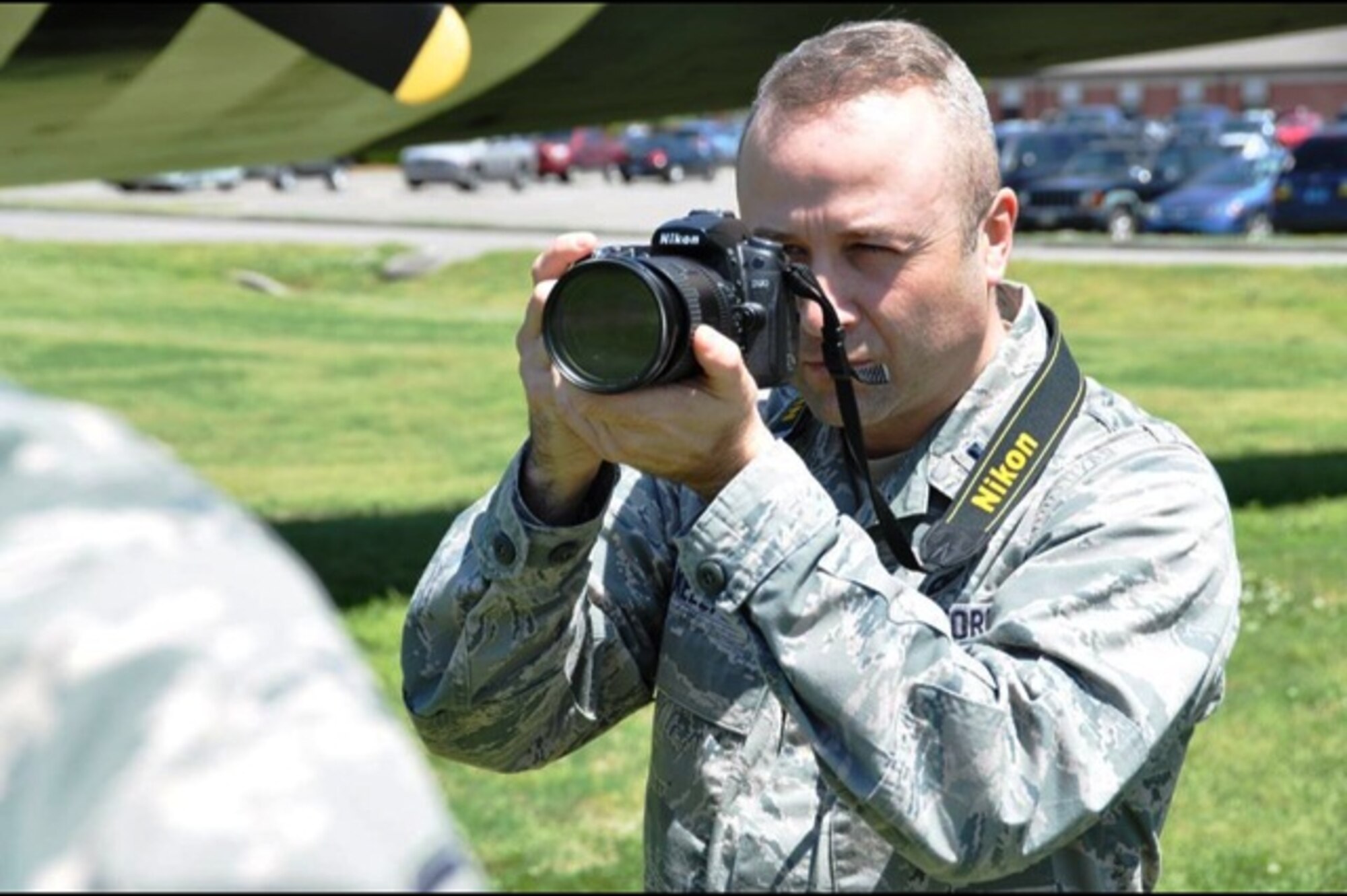 1st Lt. Jeff Kelly, from the 442d Fighter Wing at Whiteman Air Force Base, Mo. practices newly learned skills during a training course with the 1st Combat Camera Squadron this week. About 23 Air Force Reserve public affairs specialists from bases across the country showed up at Joint Base Charleston with an eagerness to improve their photo skills under the tutelage of some of the Air Force’s most elite photographers – 1st Combat Camera Airmen. (U.S. Air Force Reserve photo by Staff Sgt. Marquel Coaxum) 

