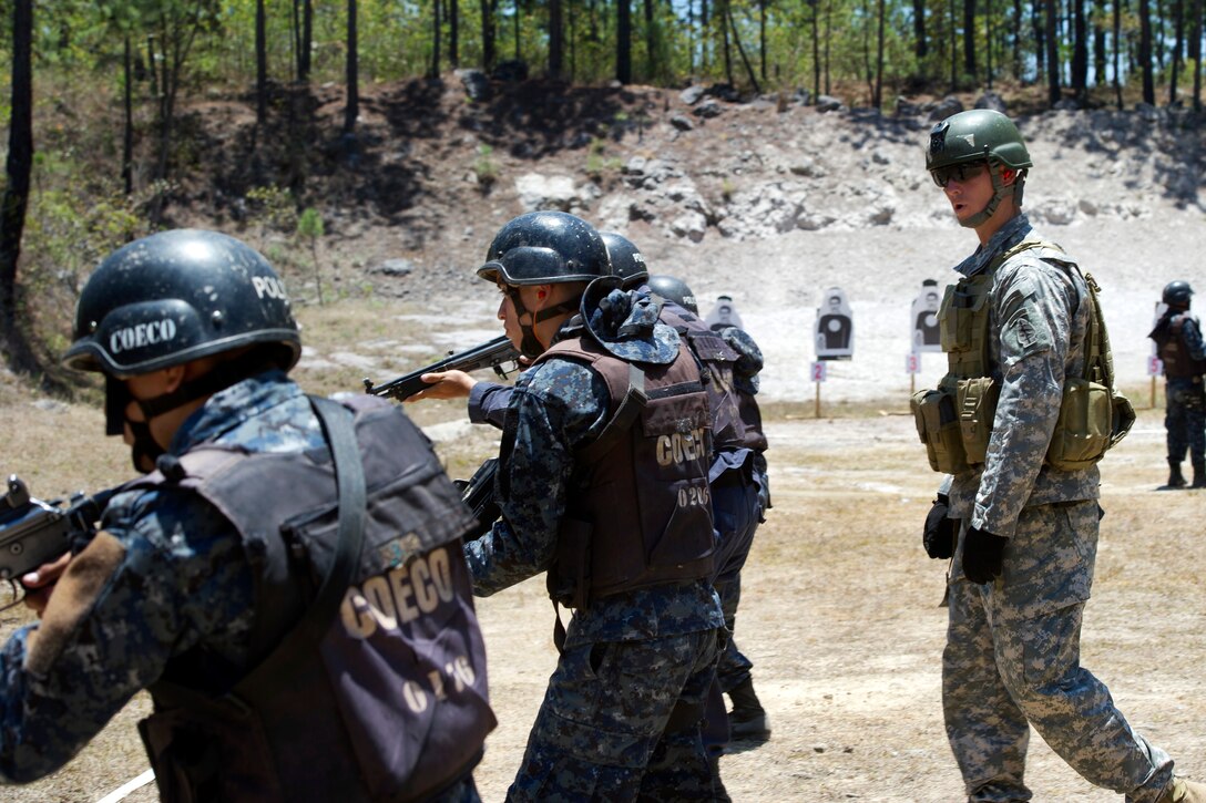 A U.S. Special Forces soldier instructs Honduran trainees in advanced rifle marksmanship on Soto Cano Air Base, Honduras, April 7, 2014.