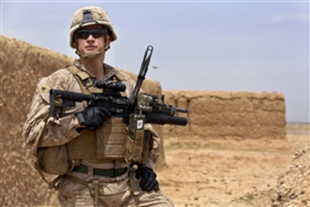 U.S. Marine Corps Cpl. Eric McGovern provides security during a patrol in Helmand province, Afghanistan, April 12, 2014. McGovern, a fire team leader, is assigned to Weapons Company, 1st Battalion, 9th Marine Regiment. The Marines patrolled to maintain a security presence in their area of operations.