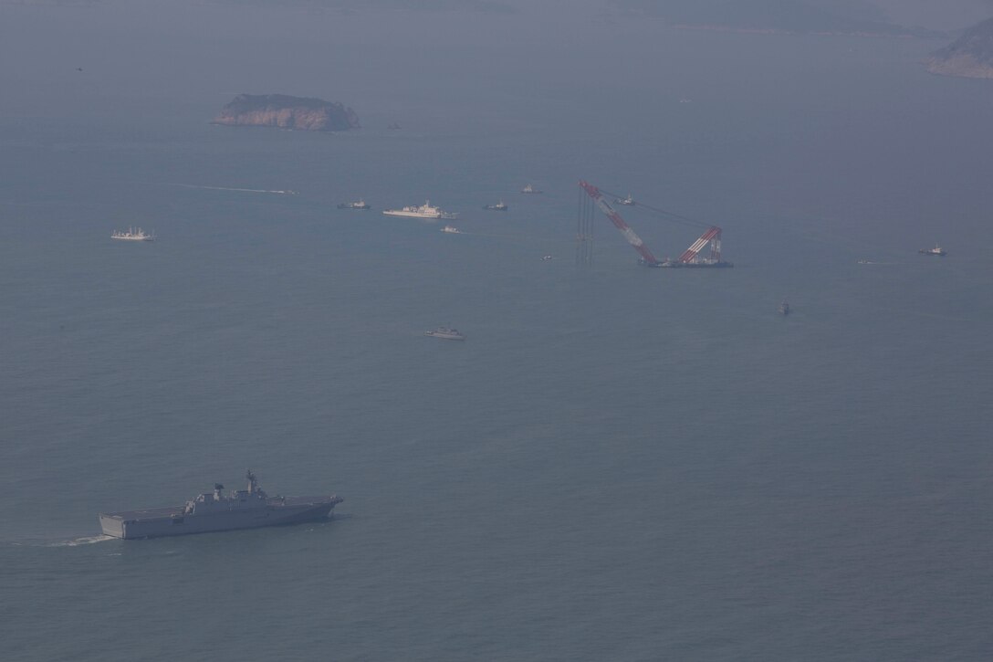 Republic of Korea ships conduct search and rescue operations for survivors of the sunken ferry Sewol off the coast of the Republic of Korea, April 20, 2014. The 31st Marine Expeditionary Unit and Amphibious Squadron 11 (PHIBRON) were conducting routine training in support of their regularly scheduled spring patrol roughly 100 nautical miles away when they were tasked to respond to the incident April 16. The 31st MEU and PHIBRON 11 provide a forward deployed maritime contingency response force capable of conducting a wide range of operations in the Asia-Pacific region.
