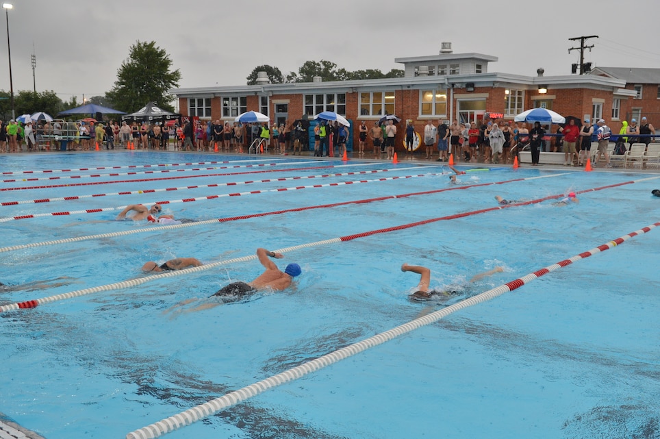 Swimmers crawl through the swim portion of the Quantico 50M Pool, on Aug. 18, 2103. The pool is scheduled to open on May 24, 2014 for military members, their families , retirees, and DOD civilians without changes in pricing from last year. 