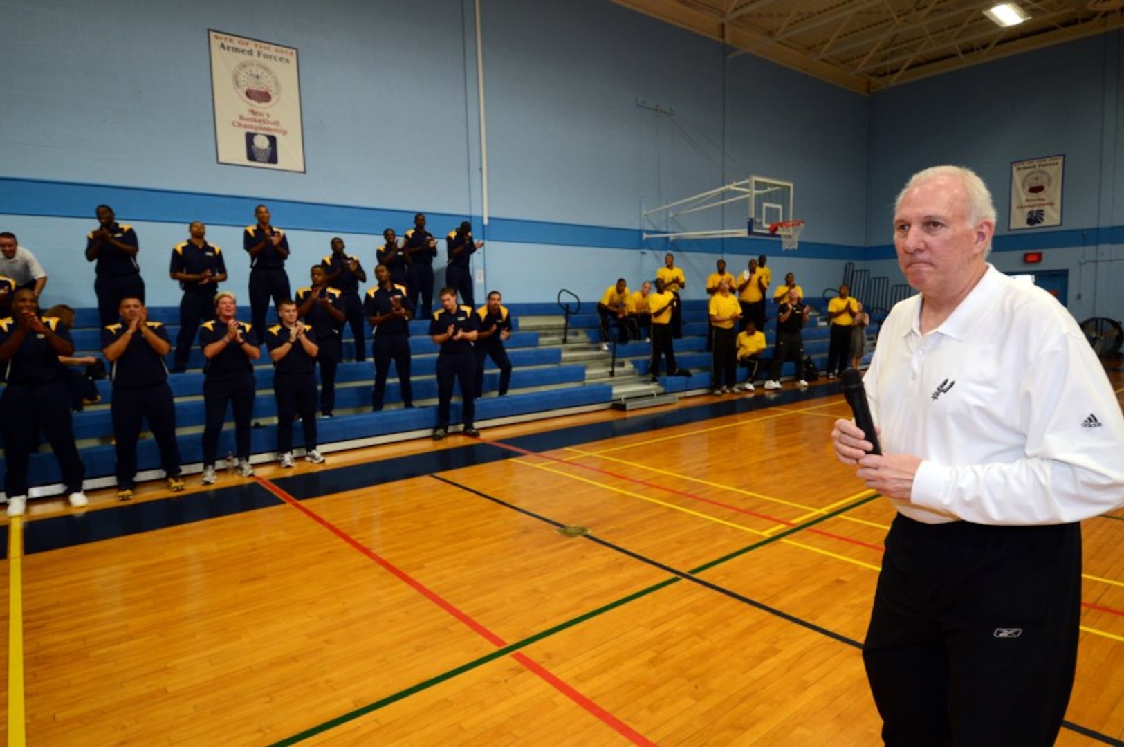 Coach Greg Popovich speaks to the players during the 2012 Armed Forces Basketball Championship on 5 November 2012.  