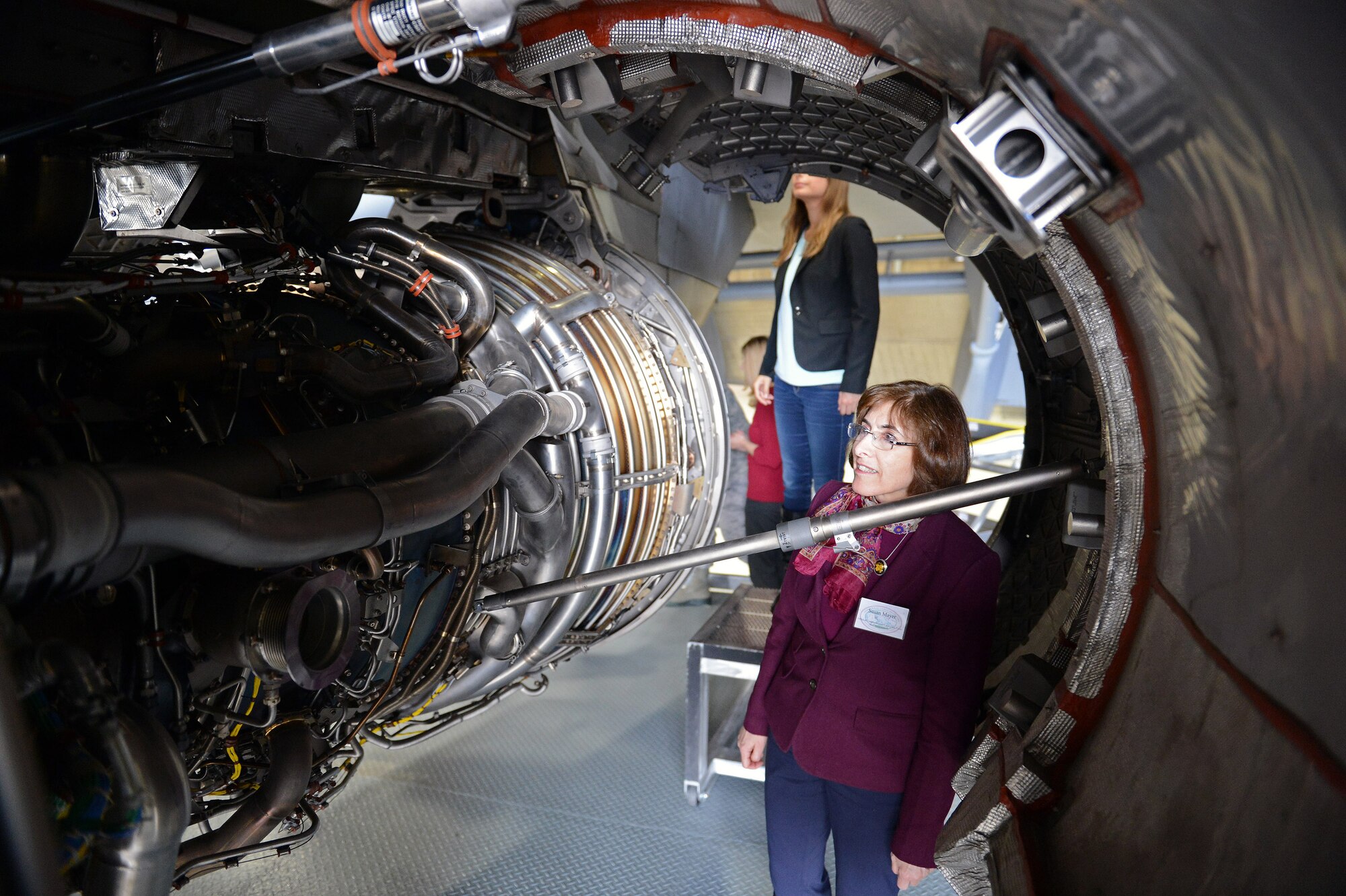 Susan Mayer, military legislative assistant to congresswoman Carol Shea-Porter (N.H.), views a C-17 Globemaster III engine during a base visit April 21, 2014, at Joint Base Lewis-McChord, Wash. Ten congressional staff delegates visited McChord Field to gain a better understanding of joint basing and the operational mission of Team McChord. (U.S. Air Force photo/Airman 1st Class Jacob Jimenez)  