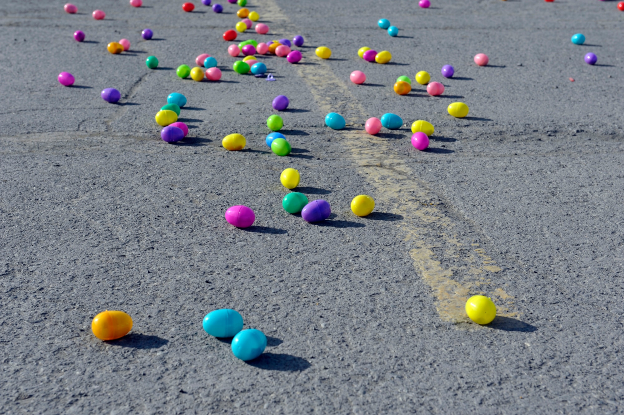 Easter eggs lie ready for collection during the Easter Eggstravaganza at the Buckner Physical Fitness Center on Joint Base Elmendorf-Richardson, Alaska, April 19, 2014. Children gathered more than 10,000 plastic eggs filled with candy, stickers and plastic toys. The Easter Eggstravaganza is an annual event the Buckner Physical Fitness Center hosts on JBER. (U.S. Air Force photo/Airman 1st Class Tammie Ramsouer)