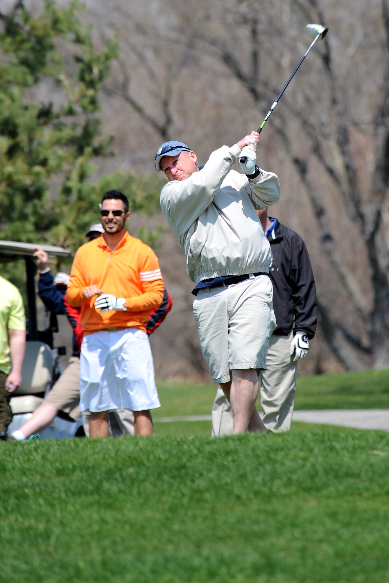 U.S. Air Force Senior Master Sgt. Johnny McKenzie, first sergeant assigned to the Air Force Weather Agency, hits a ball down the faraway while participating in the annual Sexual Assault Awareness Month Golf Tournament held at the Willow Lakes Golf Course, Neb., April 18. First Sergeants play a critical part in the tournament coming together in support of the Wing’s Sexual Assault Response Coordinator office.  (U.S. Air Force photo by Josh Plueger/Released)