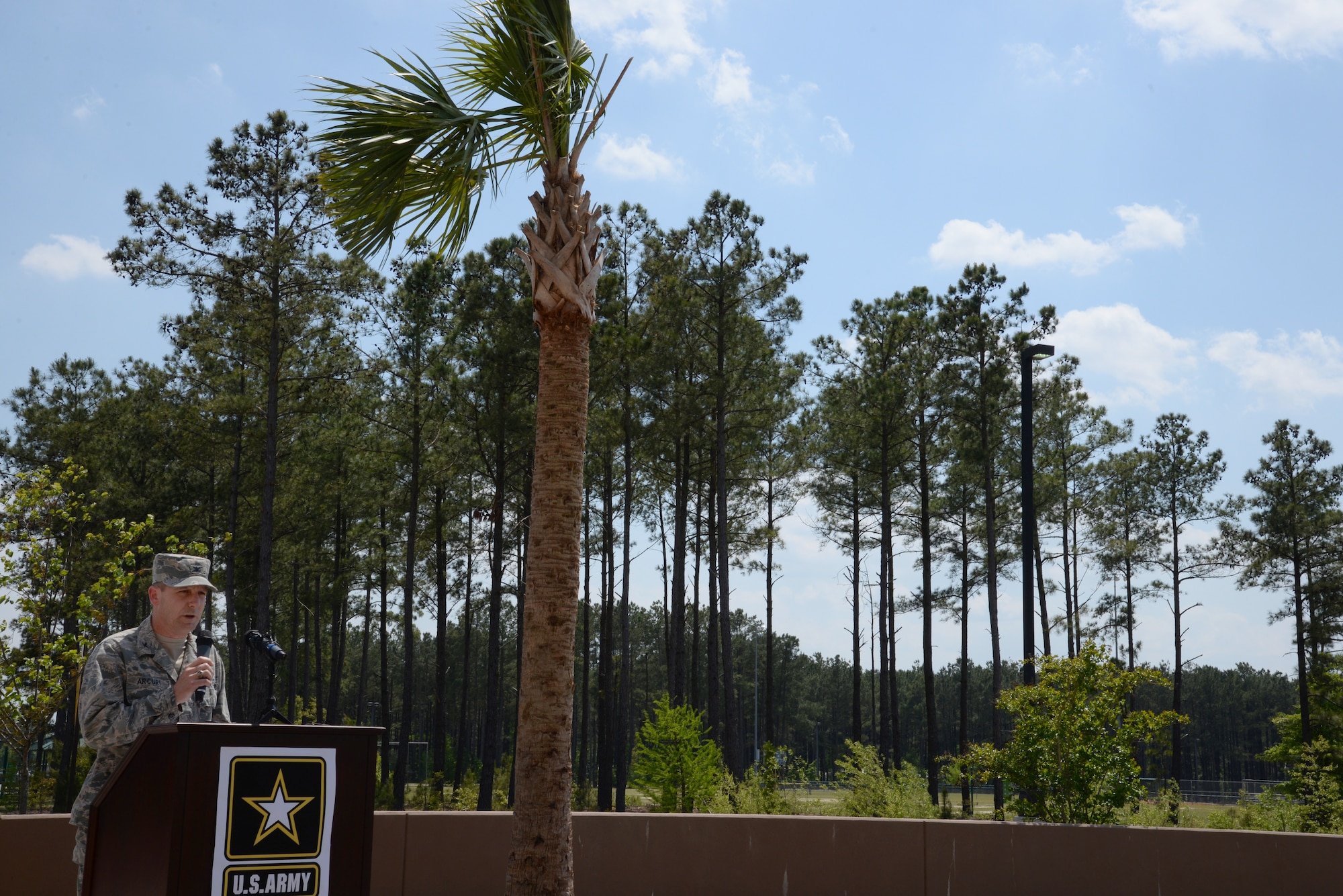 U.S. Air Force Col. Scott Arcuri, 20th Mission Support Group commander, speaks at a Team Shaw Earth Day recognition event at Shaw Air Force Base, S.C., April 22, 2014. Arcuri spoke on behalf of the 20th Fighter Wing commander and gave remarks on the pleasure of sharing a base with U.S. Army Central, and sharing a city with Sumter. (U.S. Air Force photo by Airman 1st Class Jonathan Bass/Released)