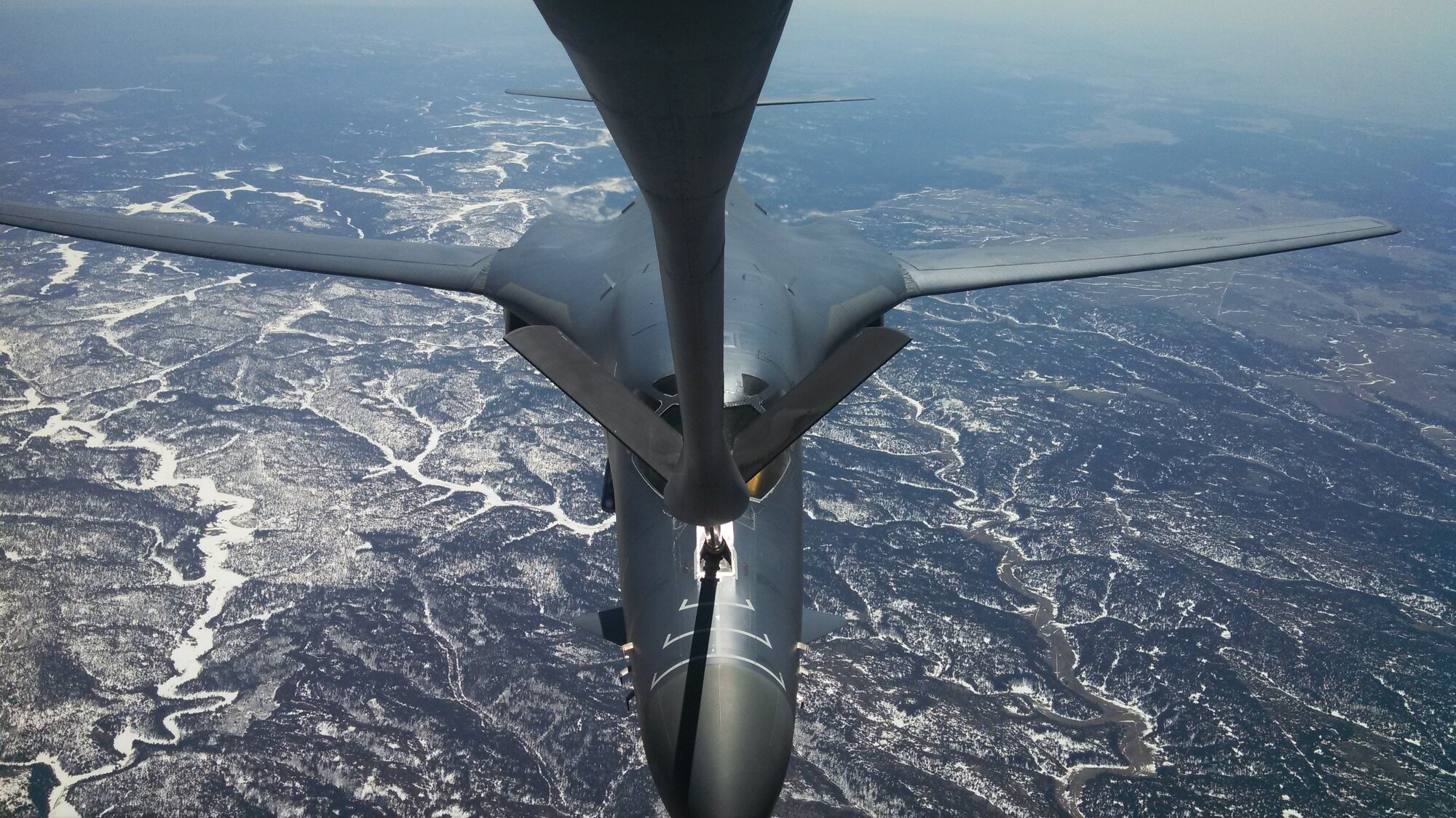A B-1B Lancer from the 28th Bomb Wing, Ellsworth Air Force Base, S.D. receives fuel from a KC-135 Stratotanker flown by the 18th Air Refueling Squadron, 931st Air Refueling Group, McConnell Air Force Base, Kan., April 21. The 931st Air Refueling Group is an Air Force Reserve associate unit to the 22nd Air Refueling Wing. (Photo courtesy of Senior Airman Sierra Dopfel).