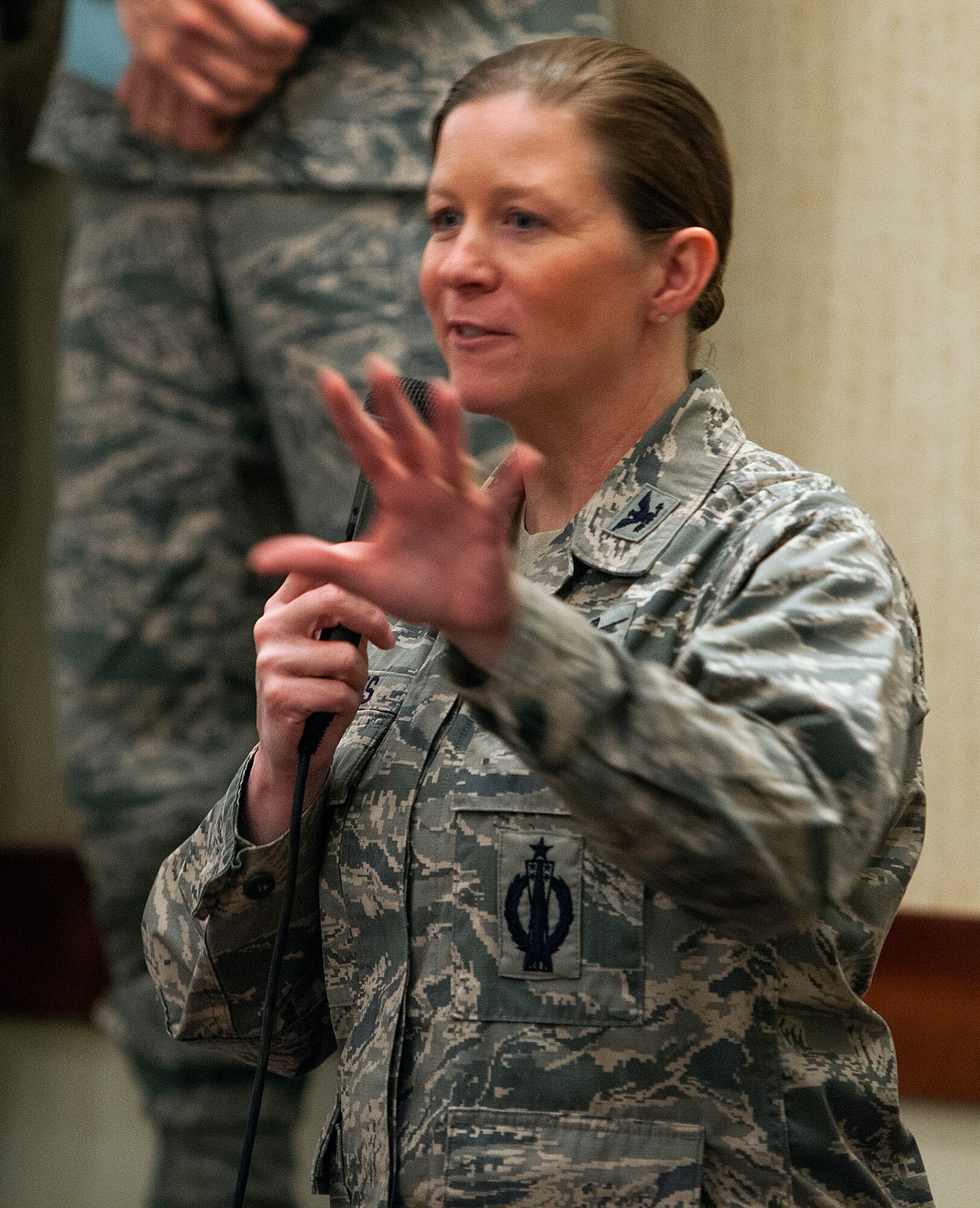 Col. Tracey Hayes, 90th Missile Wing commander, talks to the Cheyenne Chamber of Commerce Military Affairs Committee April 18, 2014, about the wing’s mission. Hayes was joined by her group commanders who addressed how each group supports the wing’s overall mission. (U.S. Air Force photo by R.J. Oriez)