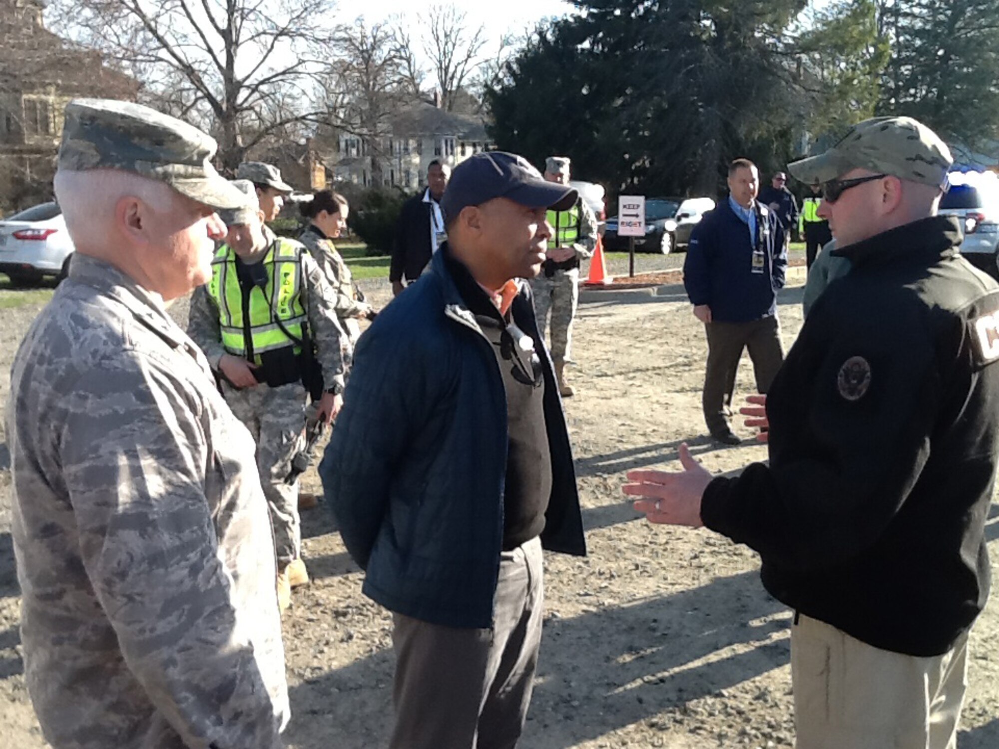 Lt. Col. Matthew Woolums, commander, 1st Civil Support Team Massachusetts National Guard briefs Gov. Deval Patrick and Maj. Gen. L. Scott Rice, The Adjutant General of the Massachusetts National Guard, prior to the start of the 118th Boston Marathon. Soldiers and Airmen of the Massachusetts National Guard and 20 other states provided support to civil authorities along the marathon route. (U.S. Air National Guard photo by Capt. Thomas Kennedy, Massachusetts Air National Guard/Released)