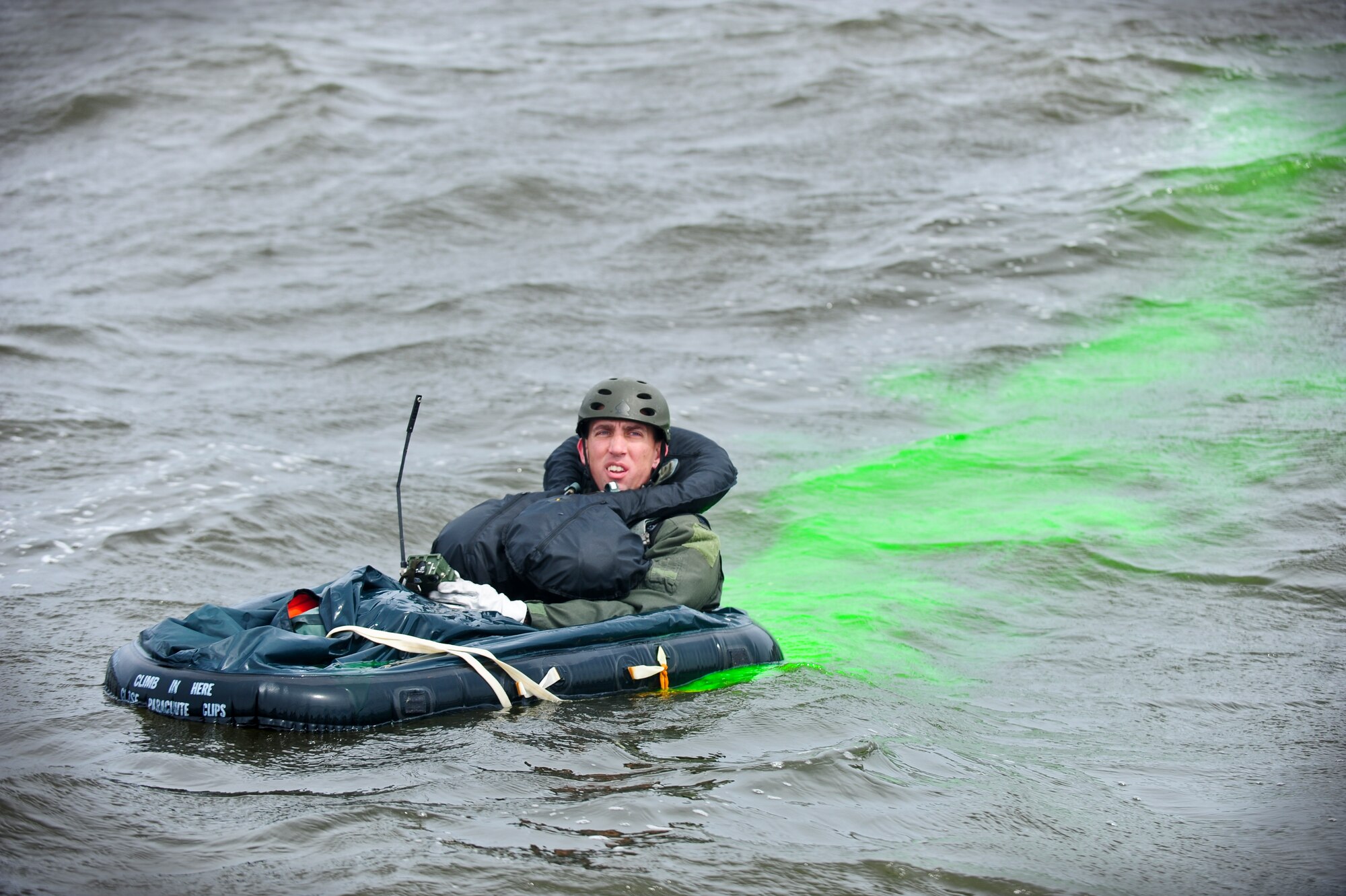 Lt. Col. Bryce Silver, 336th Fighter Squadron commander, uses radio communication and sea dye to provide his location during a search and rescue training mission, April 18, 2014, in the Neuse River outside Oriental, N.C.  Silver played the role of a downed pilot during exercise RAZOR TALON, a 4th Fighter Wing training initiative that provides a low-cost, large-force exercise training opportunity for joint East Coast tactical and support aviation units.  (U.S. Air Force photo/Airman 1st Class Brittain Crolley)  