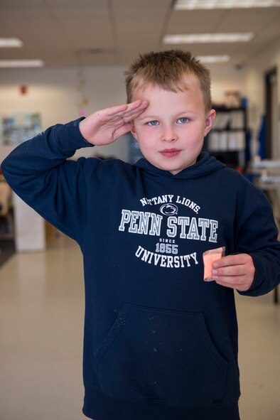 Logan Encina, 7 years old, salutes in honor of the Month of the Military Child at the Schriever Child Development Center. Logan’s parents, Master Sgt. Jamie and Staff Sgt. Holly Encina, are stationed here. (U.S. Air Force photo/Christopher DeWitt)