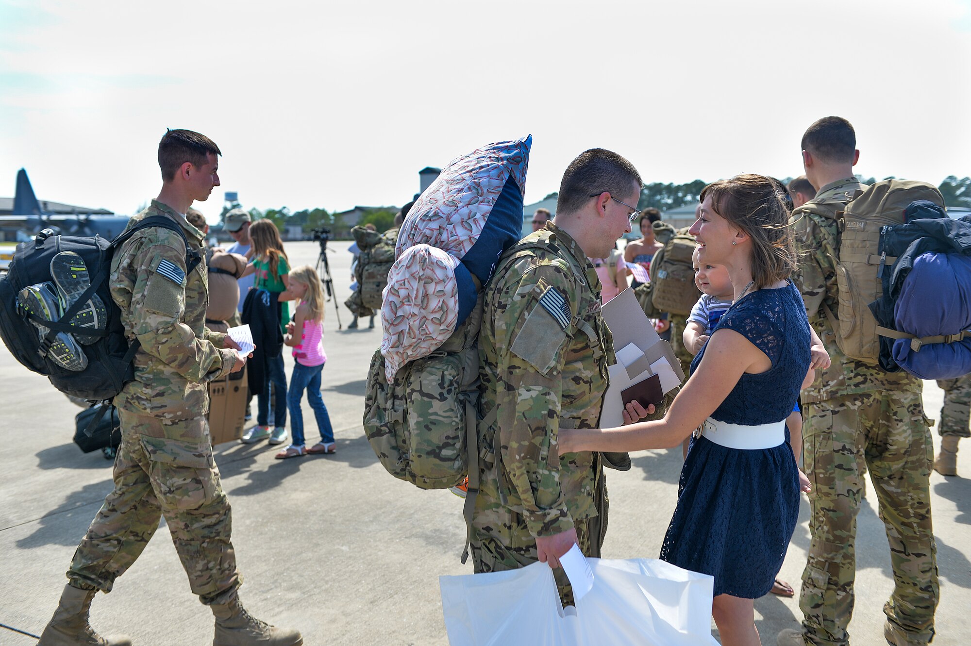 Danna and Max Shurn, greet their Airman, Capt Stephen Shurn, 15th Special Operations navigator, on Hurlburt Field, Fla., April 21, 2014. Airmen from the 15th SOS and 9th Special Operations Squadron returned from a deployment. (U.S. Air Force photo/Senior Airman Christopher Callaway)