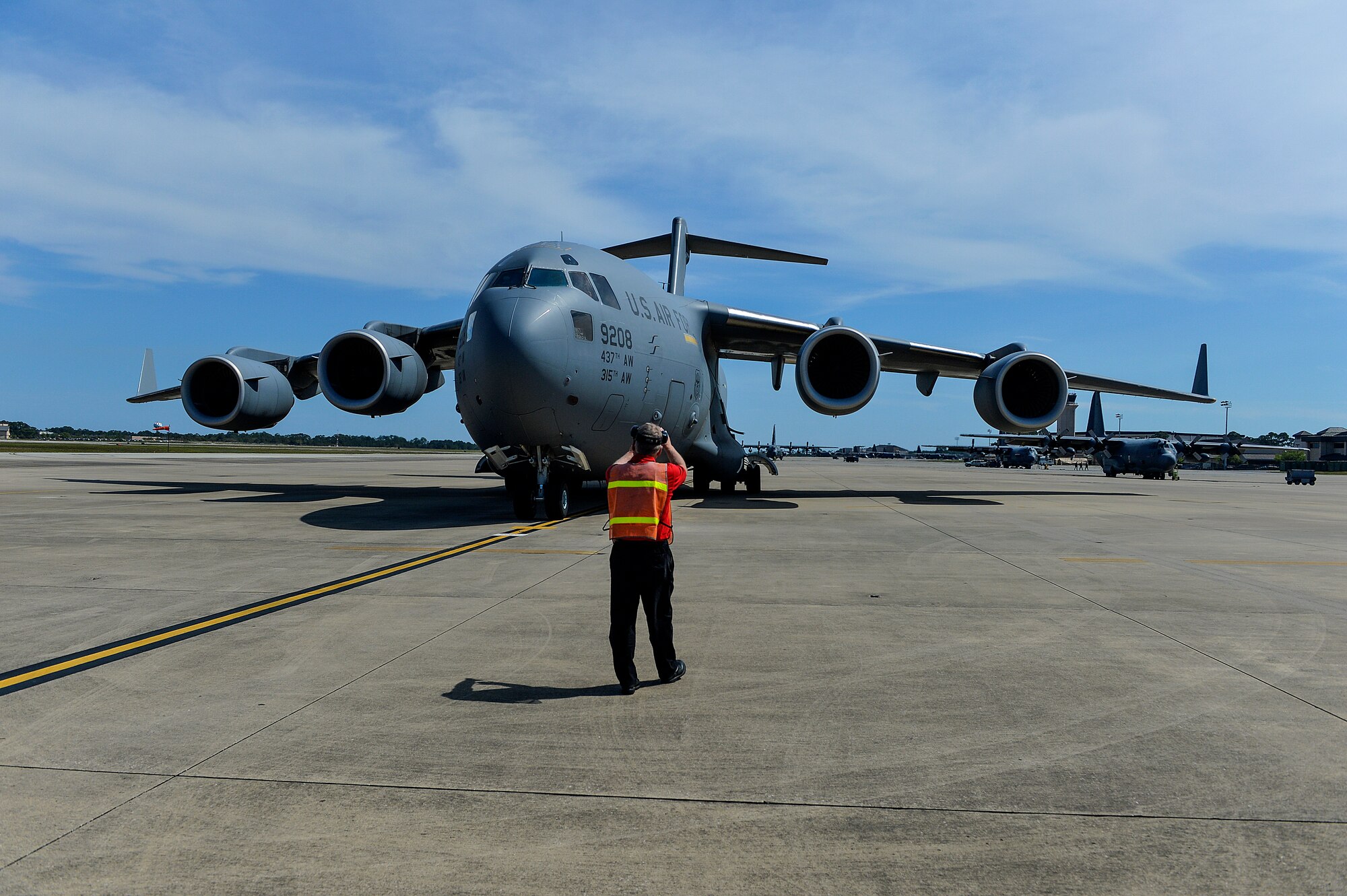 Members of the 9th Special Operations Squadron and 15th Special Operations Squadron return from deployment on Hurlburt Field, Fla., April 21, 2014. The Airmen landed on the flightline aboard a C-17 Globemaster III. (U.S. Air Force photo/Senior Airman Christopher Callaway)