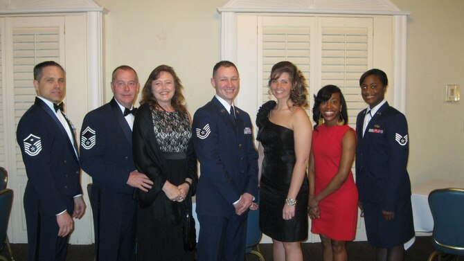 Representatives of the 908th at the 2013 Maxwell-Gunter Awards Banquet, from left: Master Sgt. Nicholas Kennelly, 357th Airlift Squadron First Sergeant of the Year; Senior Master Sgt. Michael Eubanks of the 908th MXG, SNCO of the Year; Celena Eubanks, Technical Sgt. Stephin Smith of the 908th MXS, NCO of the Year;  Hanna Smith, Nastassia Webster, representing her husband, Senior Airman Chance Webster, 908th SFS, Airman of the Year; and Staff Sgt. Shaniqua Rogers.