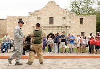 Air Force Military Working Dogs and their handlers demonstrate the unique capabilities and vital mission of military working dogs April 21 during the San Antonio Fiesta 2014’s Air Force Day at the Alamo. (U.S. Air Force photo by Ben Faske)