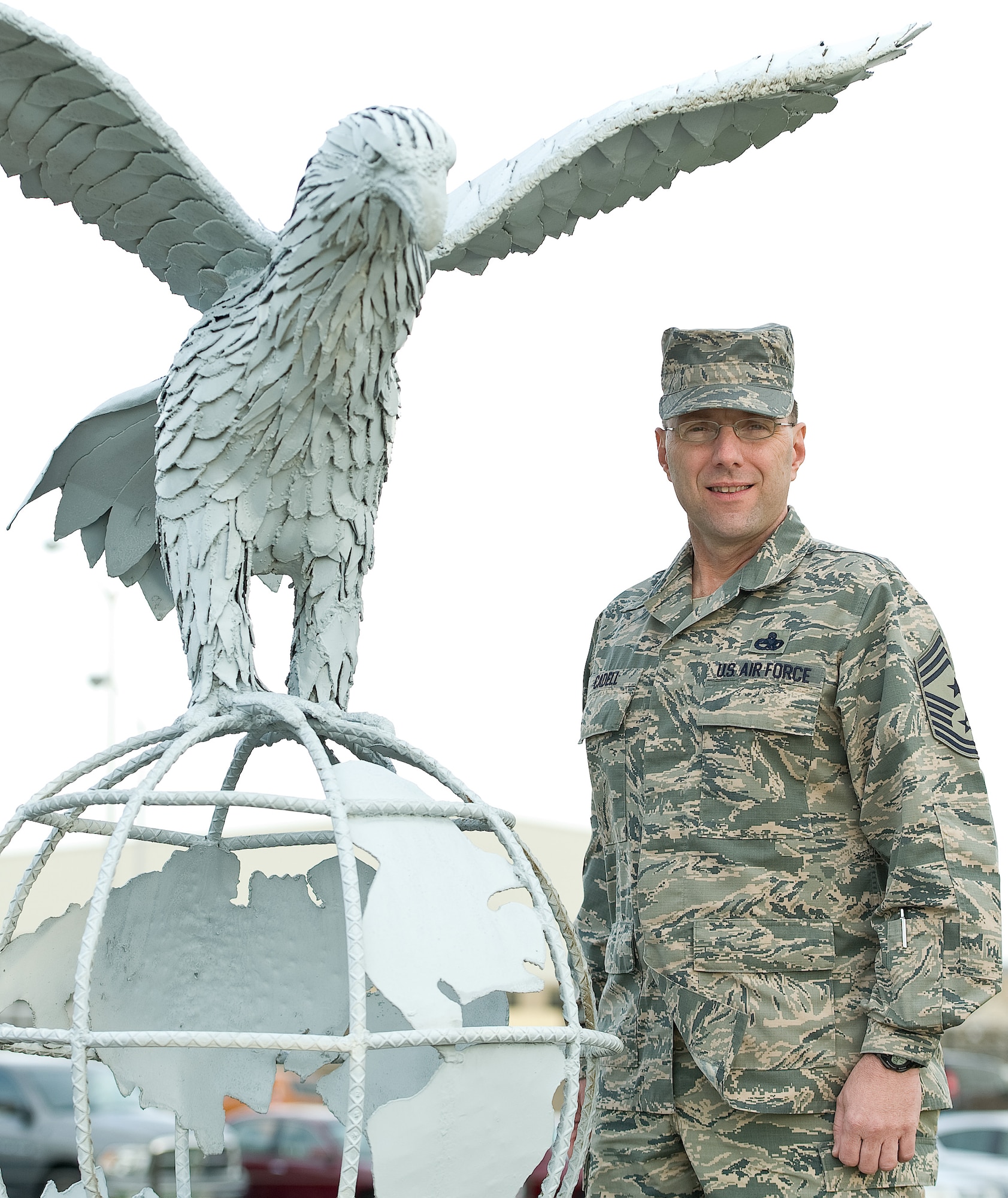Chief Master Sgt. Stanley C.P. Cadell, the Command Chief Master Sergeant, 436th Airlift Wing, Dover Air Force Base, Del., poses for a photo April 11, 2014. Cadell serves as the principle advisor to the commander on matters of health, welfare and morale, professional development, good order and discipline, and the effective employment of more than 3,100 enlisted members of Dover AFB's Eagle Wing. (U.S. Air Force photo/Roland Balik)