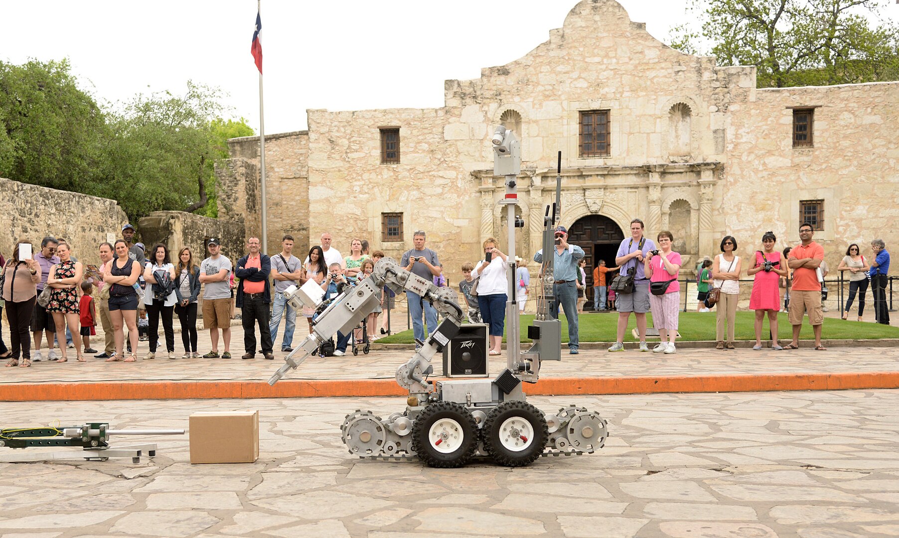 502nd Civil Engineer Squadron Explosive Ordnance Disposal technicians from Joint Base San Antonio-Lackland use a robot to demonstrate methods of bomb disposal during San Antonio’s Fiesta 2014 Air Force Day at the Alamo April 21. Since its beginning in 1891, Fiesta’s focus is to honor to the heroes of the Alamo and the Battle of San Jacinto. (U.S. Air Force photo by Ben Faske)