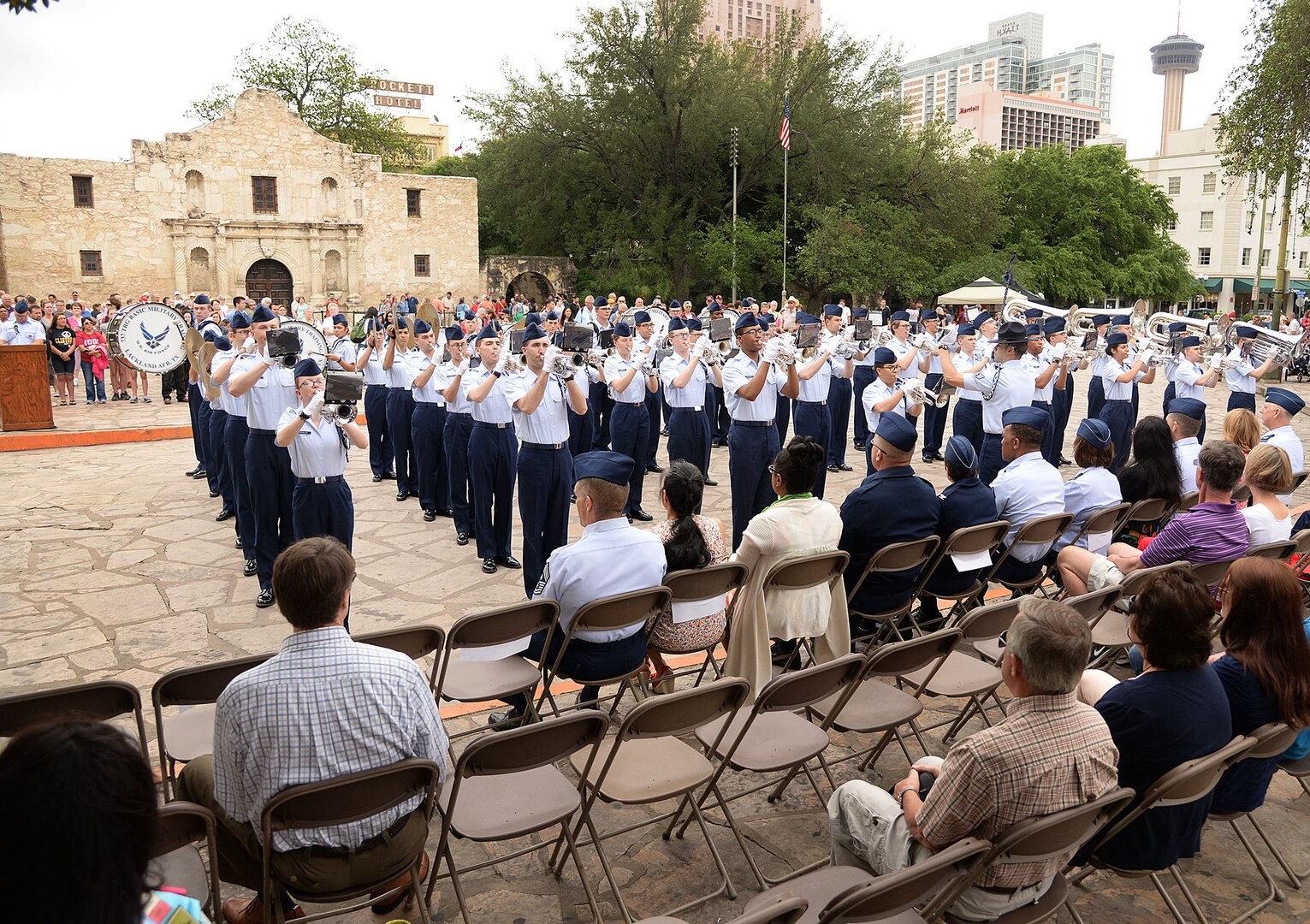Joint Base San Antonio-Lackland Drum and Bugle Corps, comprised of JBSA-Lackland basic military trainees who have been in the Air Force less than eight weeks, perform at the San Antonio Fiesta 2014 April 21 during Air Force Day at the Alamo. (U.S. Air Force photo by Ben Faske)
