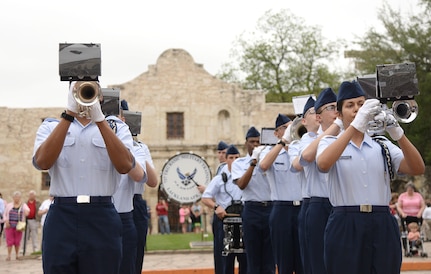 Joint Base San Antonio-Lackland Drum and Bugle Corps, comprised of JBSA-Lackland basic military trainees who have been in the Air Force less than eight weeks, perform at the San Antonio Fiesta 2014 April 21 during Air Force Day at the Alamo. (U.S. Air Force photo by Ben Faske)