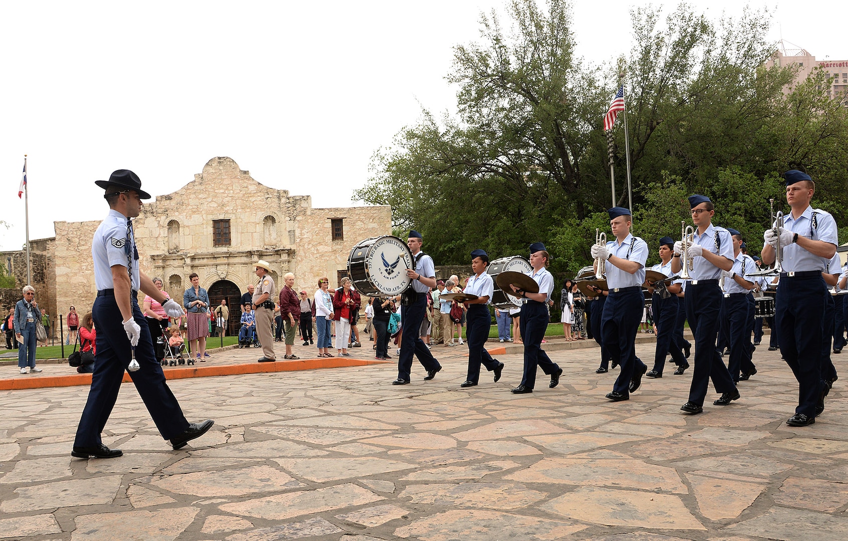 Joint Base San Antonio-Lackland Drum and Bugle Corps, comprised of JBSA-Lackland basic military trainees who have been in the Air Force less than eight weeks, perform at the San Antonio Fiesta 2014 April 21 during Air Force Day at the Alamo.   From its beginning in 1891, Fiesta has grown into an annual celebration that includes civic and military observances, street and river float parades, exhibits, sports, music and food representing the spirit, diversity and vitality of San Antonio. (U.S. Air Force photo by Ben Faske)