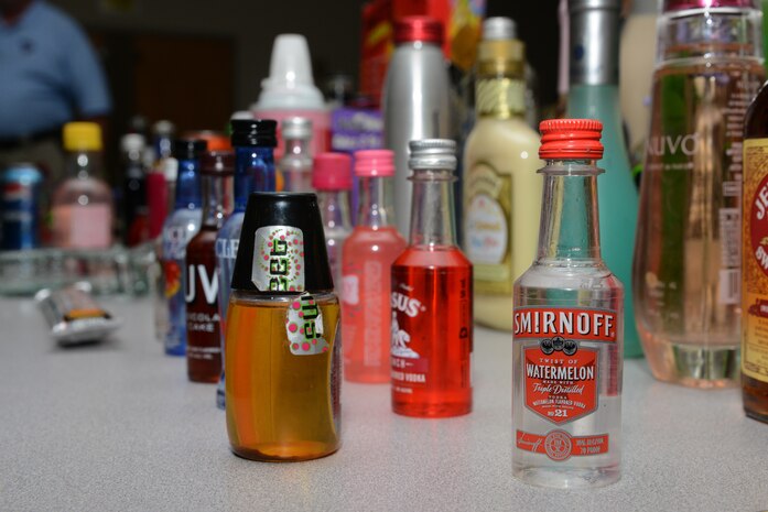 Members of the 628th Air Base Wing Security Forces Squadron are briefed by the alcohol enforcement team and fake ID training teams on how to detect alcohol with Passive Alcohol Sensors at Joint Base Charleston April 18, 2014, at JB Charleston – Air Base, S.C. The project is designed to decrease the number of first-time alcohol-related incidents among underage military personnel on Join Base Charleston and decrease the incidents of unintentional injuries related to alcohol consumption among underage military personnel. (U.S. Air Force photo/ Airman Basic Chacarra Neal) 