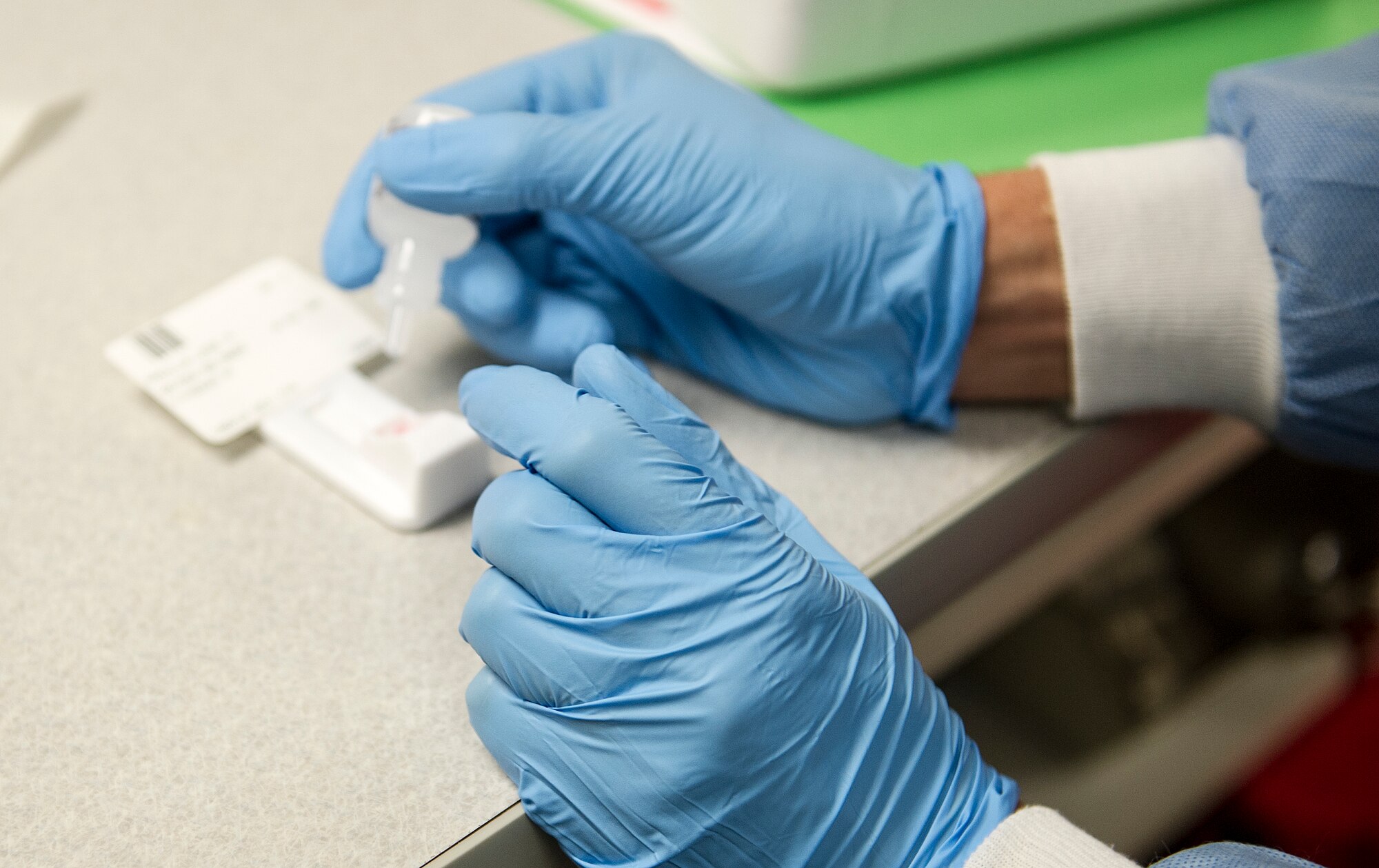A medical laboratory technician preps a swab test at Hurlburt Field, Fla., April 14, 2014. Swab tests are used to help diagnose infections such as strep throat. (U.S. Air Force photo/Airman 1st Class Jeff Parkinson)