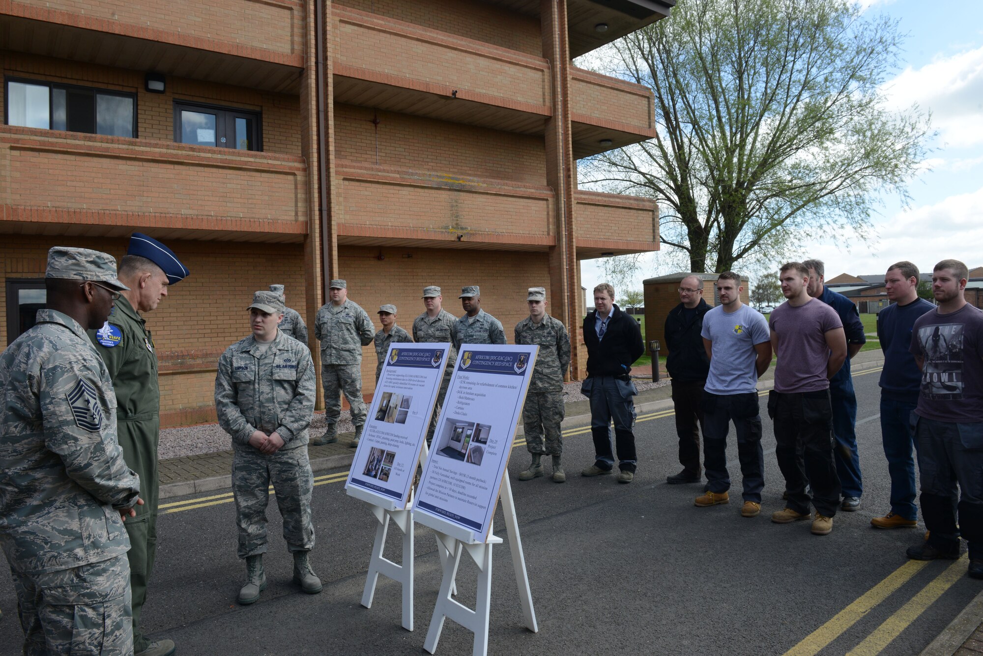 Tech. Sgt. Jeff Empson, 423rd Civil Engineer Squadron, briefs Gen. Frank Gorenc, U.S. Air Forces in Europe and Air Forces Africa commander, and Chief Master Sgt. James Davis, USAFE-AFAFRICA command chief, about the contingency dorm renovation at RAF Alconbury, April 15. The contingency dorm project, designed to save lodging costs for personnel on temporary duty to the mission partners at RAF Molesworth, was one of several innovations that Airmen from the 501st Combat Support Wing highlighted during the USAFE-AFAFRICA’s leadership team visit. (U.S. Air Force photo by Tech. Sgt. Chrissy Best)