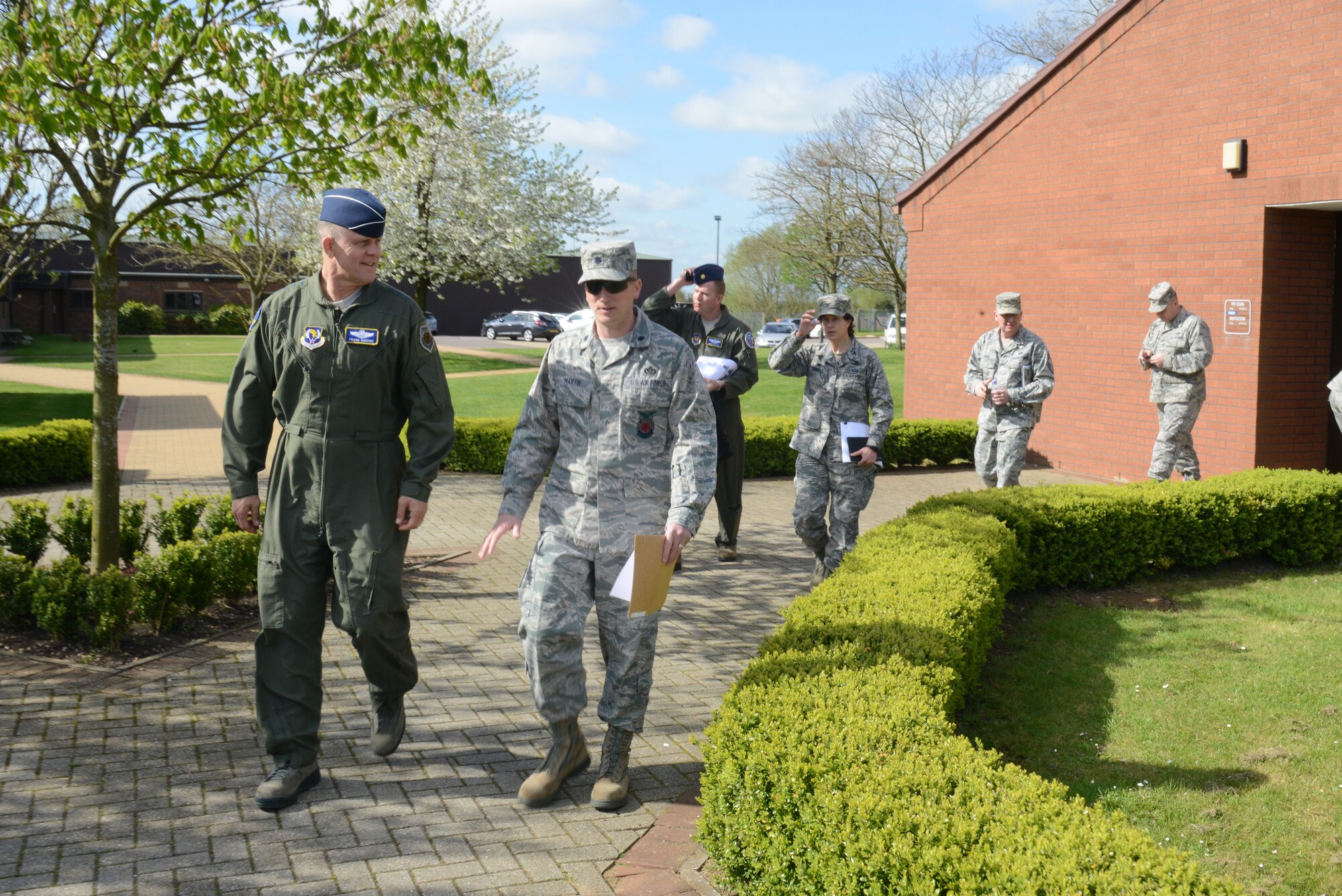 Lt. Col. Rick Martin, 423rd Civil Engineer Squadron commander, speaks with Gen. Frank Gorenc, U.S. Air Forces in Europe and Air Forces Africa commander, on the way to a briefing at the RAF Alconbury Fire Department, April 15. Airmen from six of the seven 501st Combat Support Wing installations briefed the USAFE-AFAFRICA leadership team on the diverse nature of the 501st CSW mission. (U.S. Air Force photo by Tech. Sgt. Chrissy Best)