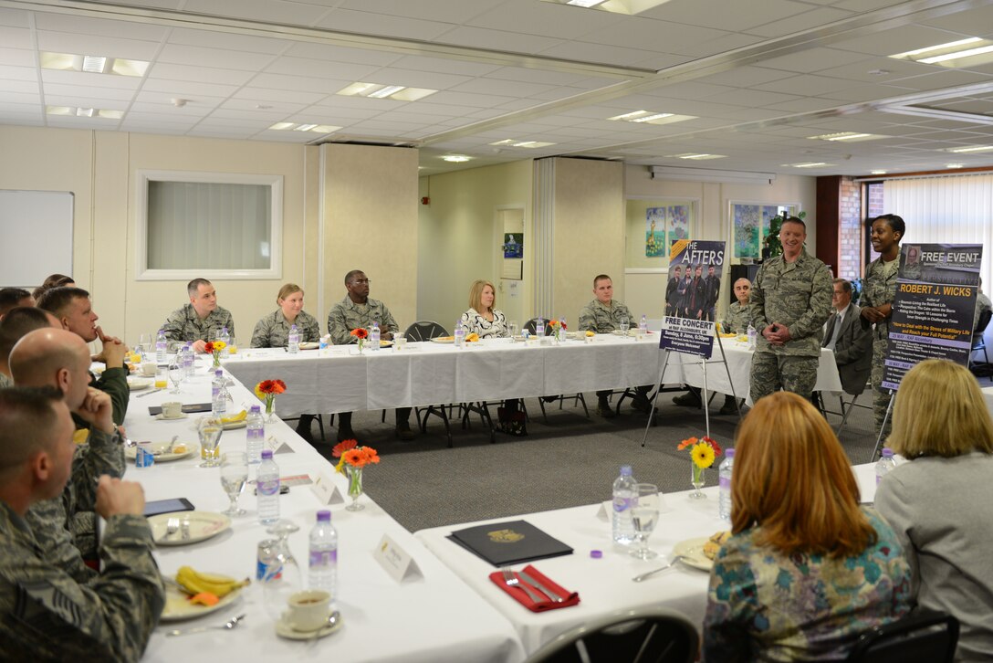 Chaplain (Capt.) Tim Warf, 423rd Air Base Group, and Tech. Sgt. Rosalind Wilson, 423rd Air Base Group, brief Gen. Frank Gorenc, U.S. Air Forces in Europe and Air Forces Africa commander, and Chief Master Sgt. James Davis, USAFE-AFAFRICA command chief, about resiliency events being planned throughout the 501st Combat Support Wing, April 15. The USAFE-AFAFRICA leadership team learned about the diverse and innovative team that is the 501st CSW during a one-day visit to RAF Alconbury. (U.S. Air Force photo by Tech. Sgt. Chrissy Best)