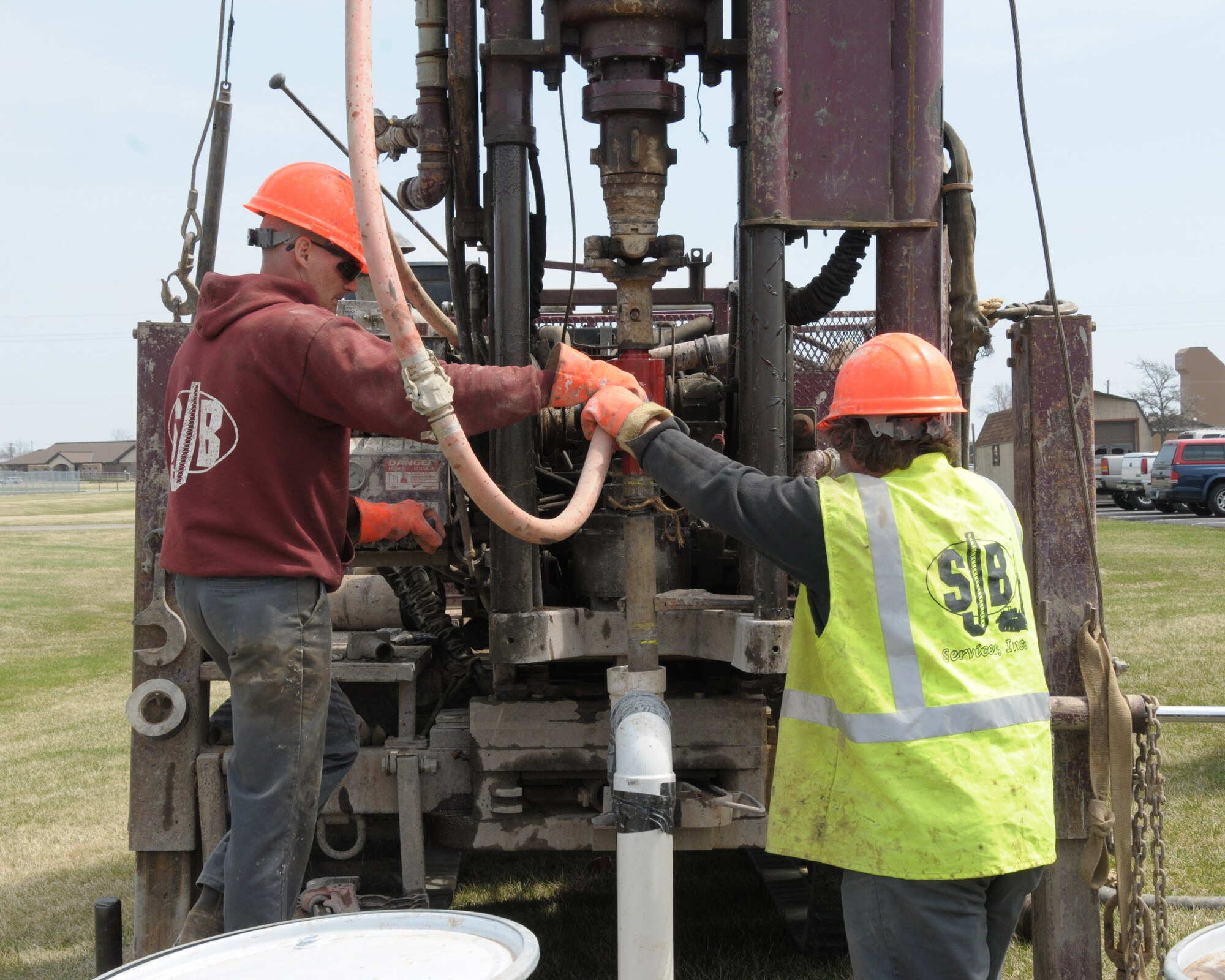 Workers from EA Engineering P.C. and its affiliate EA Science and Technology are drilling monitoring wells and soil borings at the Niagara Falls Air Reserve Station, N.Y. on April 21, 2014. The contractor is preforming a pre design investigation to help reduce environmental contamination. (U.S. Air Force photo by Peter Borys)